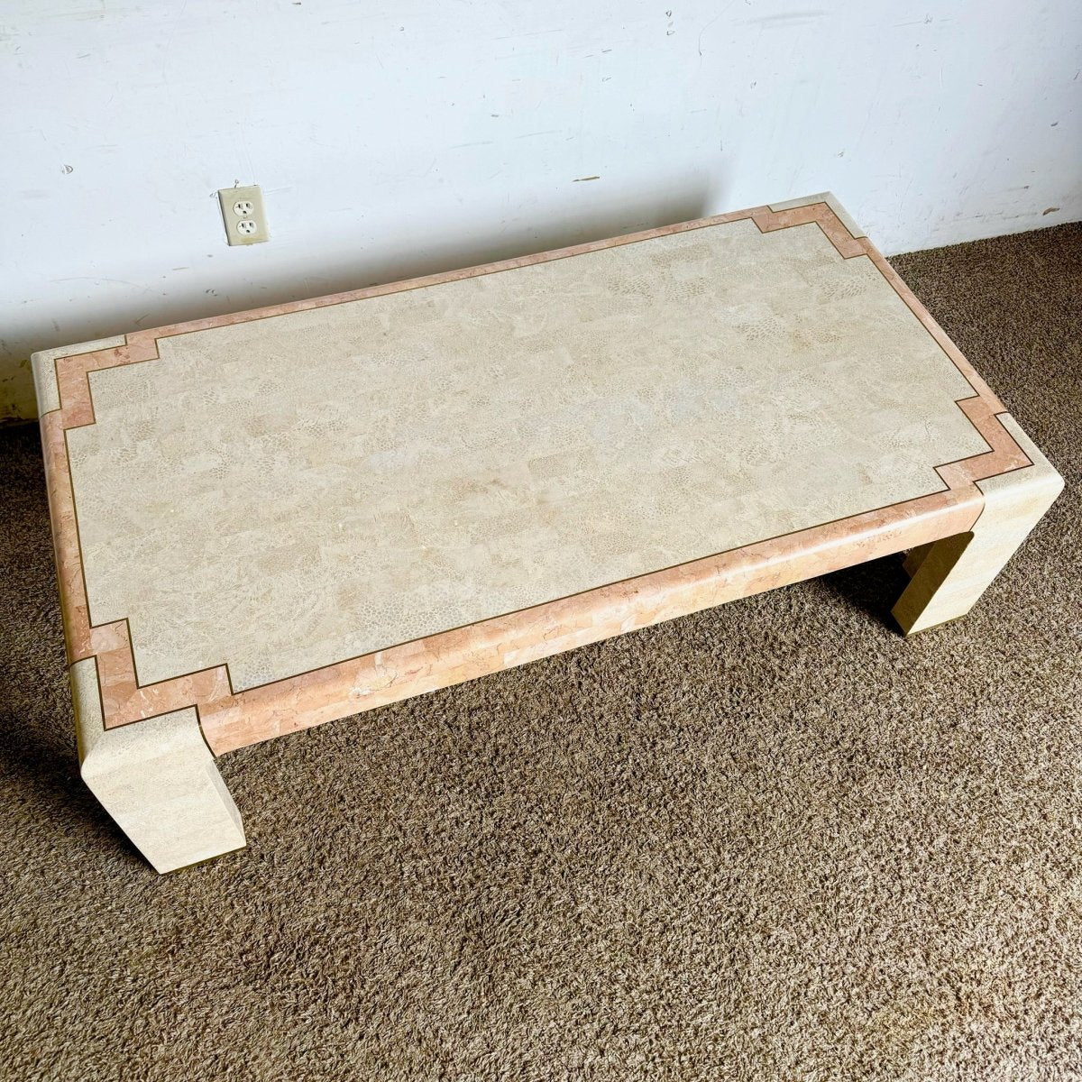 Postmodern Beige and Pink Tessellated Stone Coffee Table With Brass Inlay - Dolphin & Flamingo