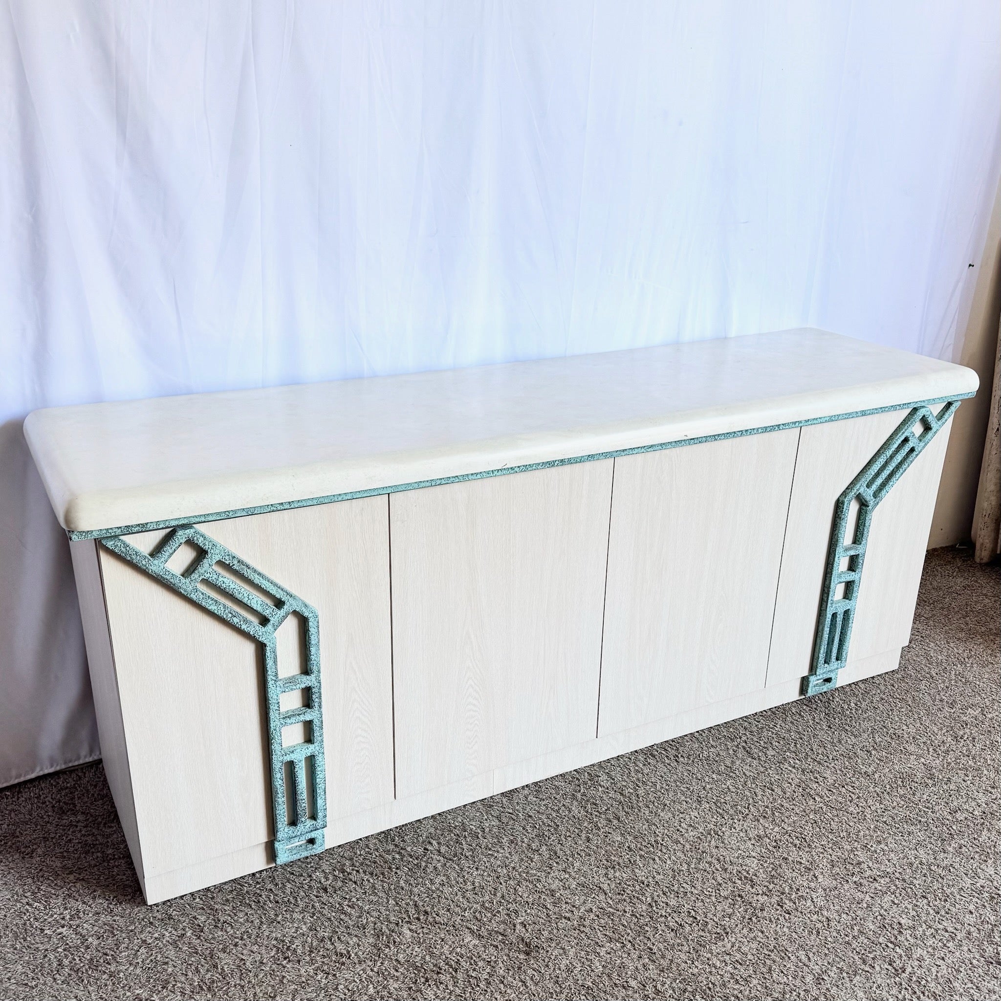 Postmodern Beige Wood Grain Laminate Credenza With Tribal Turquoise Metal Accents - Dolphin & Flamingo