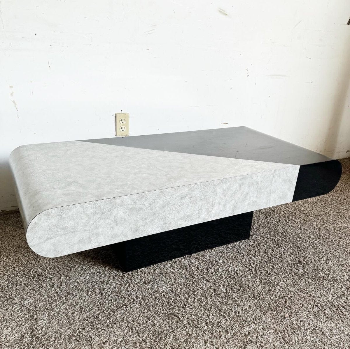 Postmodern Black Gloss and Faux Stone Laminate Bullnose Coffee Table - Dolphin & Flamingo