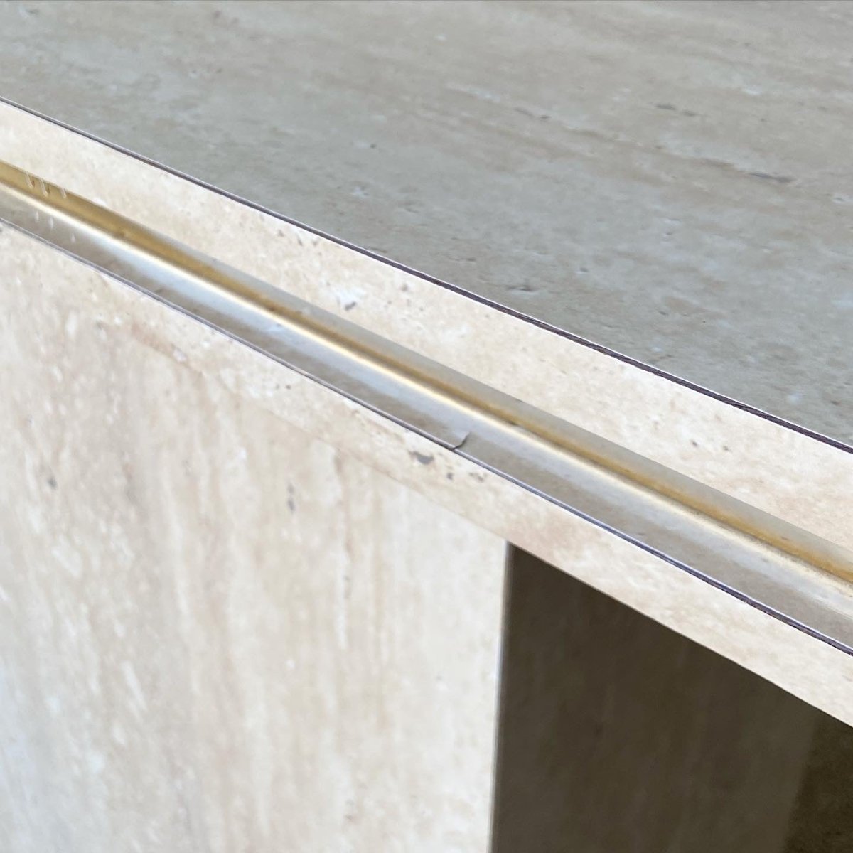 Postmodern Faux Travertine Laminate Console Table With Gold Trim - Dolphin & Flamingo