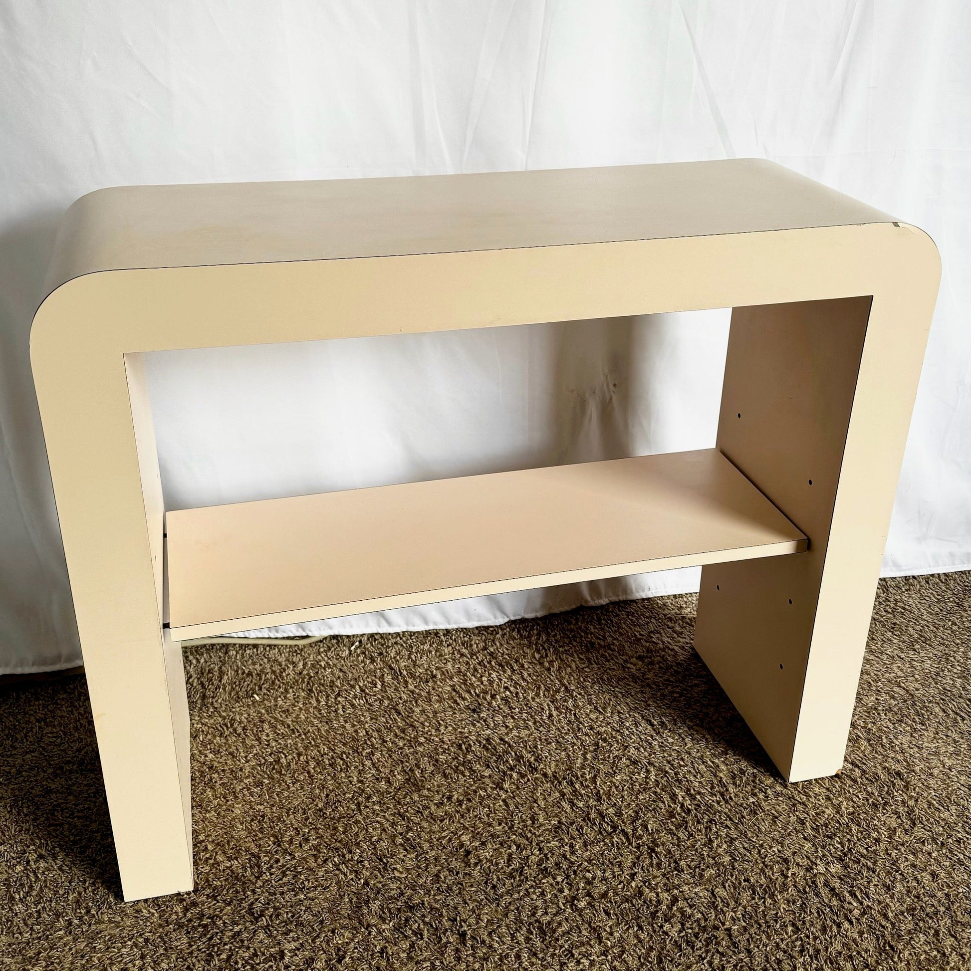 Postmodern Light Pink Laminate Waterfall Console With Adjustable Shelf - Dolphin & Flamingo