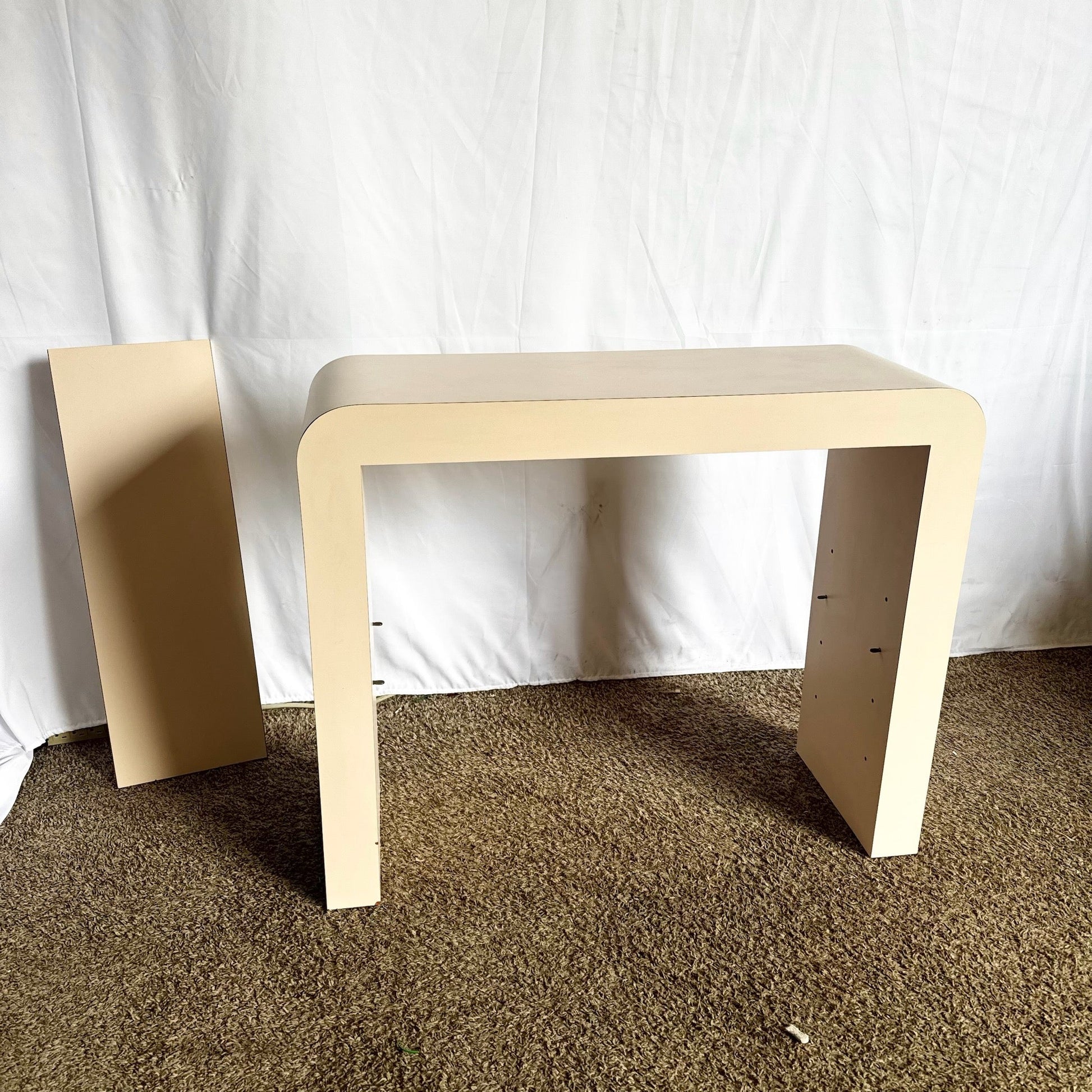 Postmodern Light Pink Laminate Waterfall Console With Adjustable Shelf - Dolphin & Flamingo