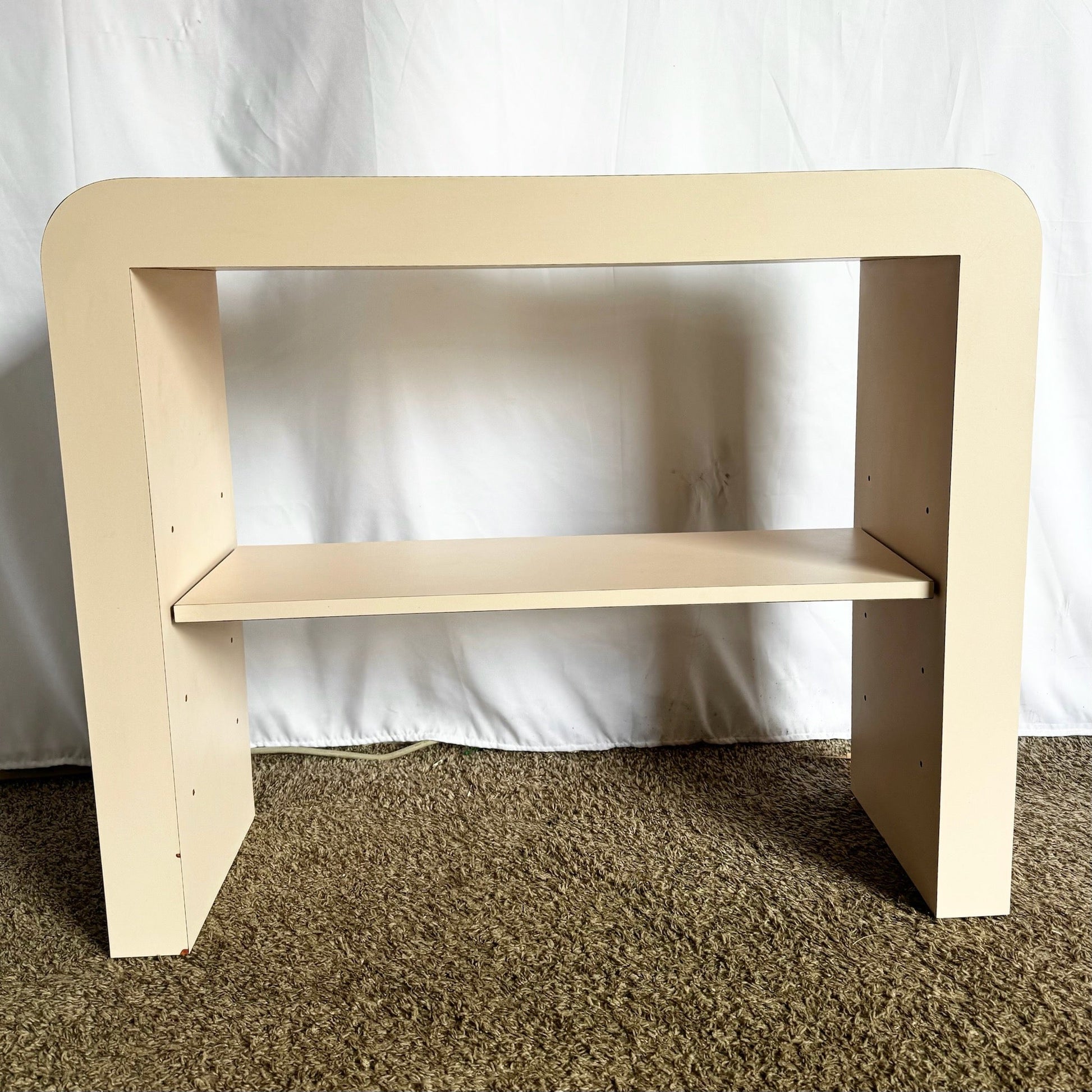 Postmodern Light Pink Laminate Waterfall Console With Adjustable Shelf - Dolphin & Flamingo