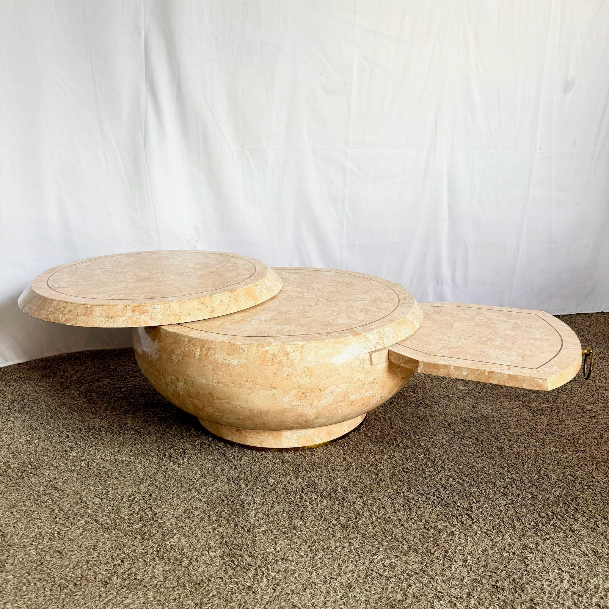 Postmodern Pink Tessellated Stone Swivel Top Coffee Table With Extension and Brass Inlay - Dolphin & Flamingo