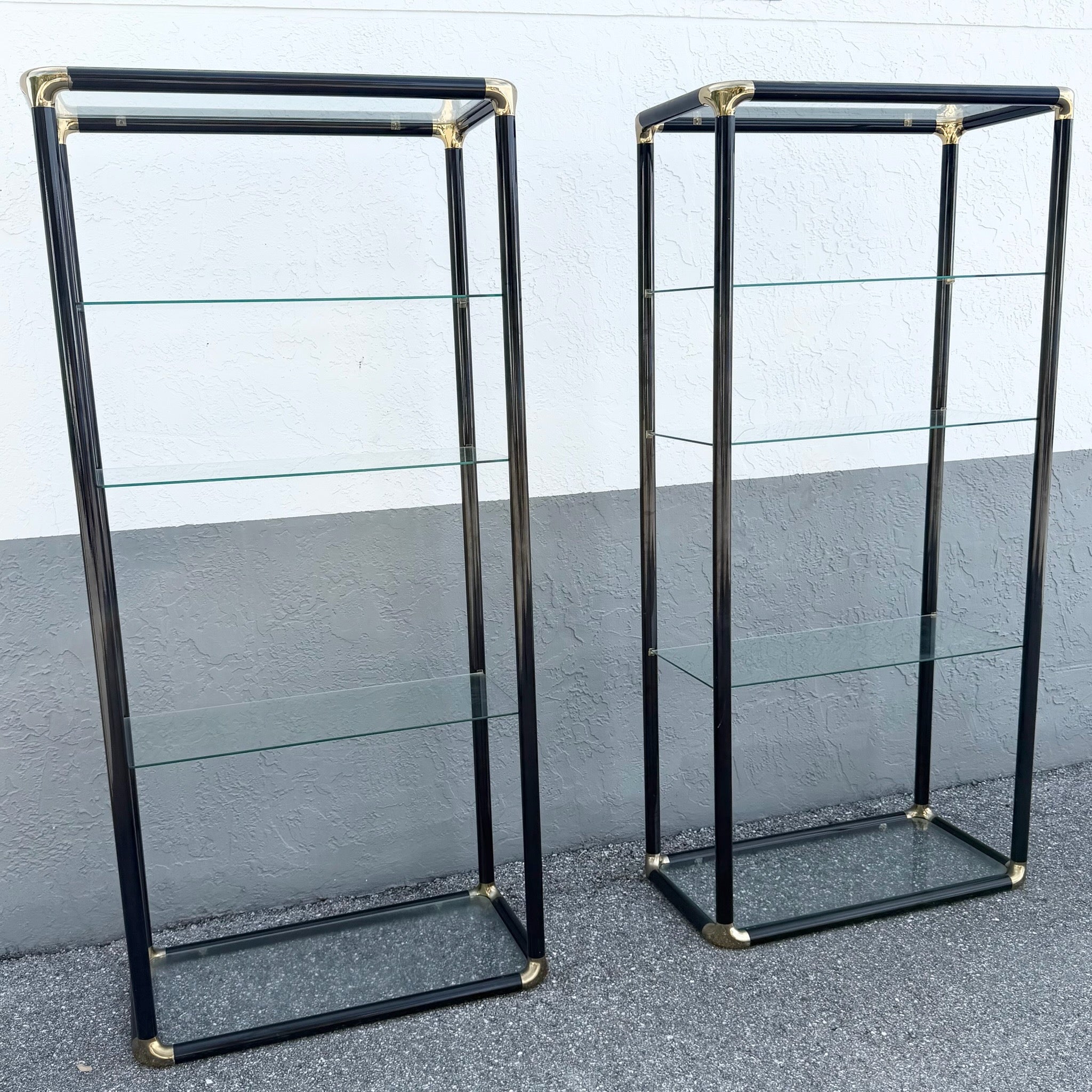 Art Deco Black Lacquered Etagere With Gold Accents and Glass Shelves - A Pair Dolphin & Flamingo