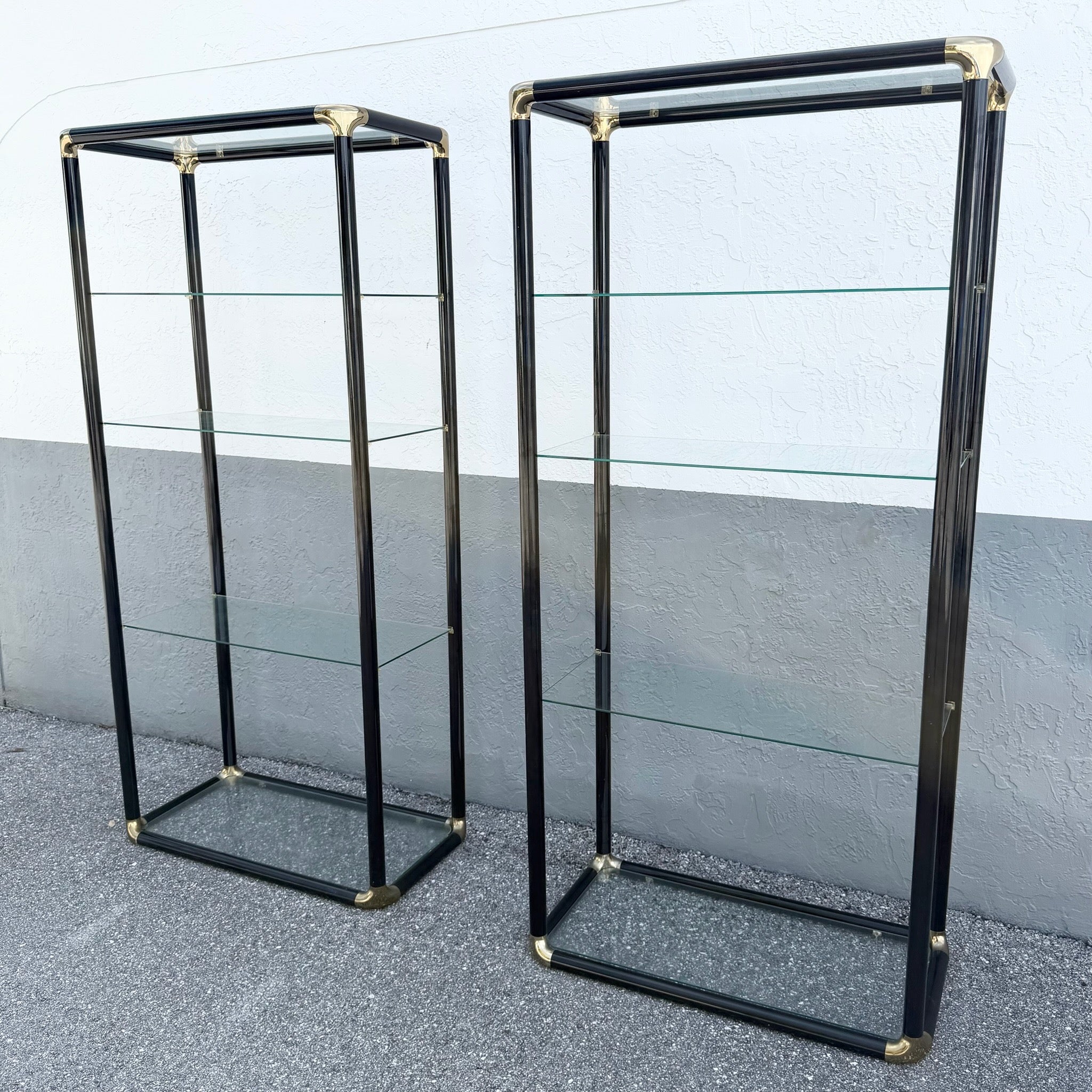Art Deco Black Lacquered Etagere With Gold Accents and Glass Shelves - A Pair Dolphin & Flamingo