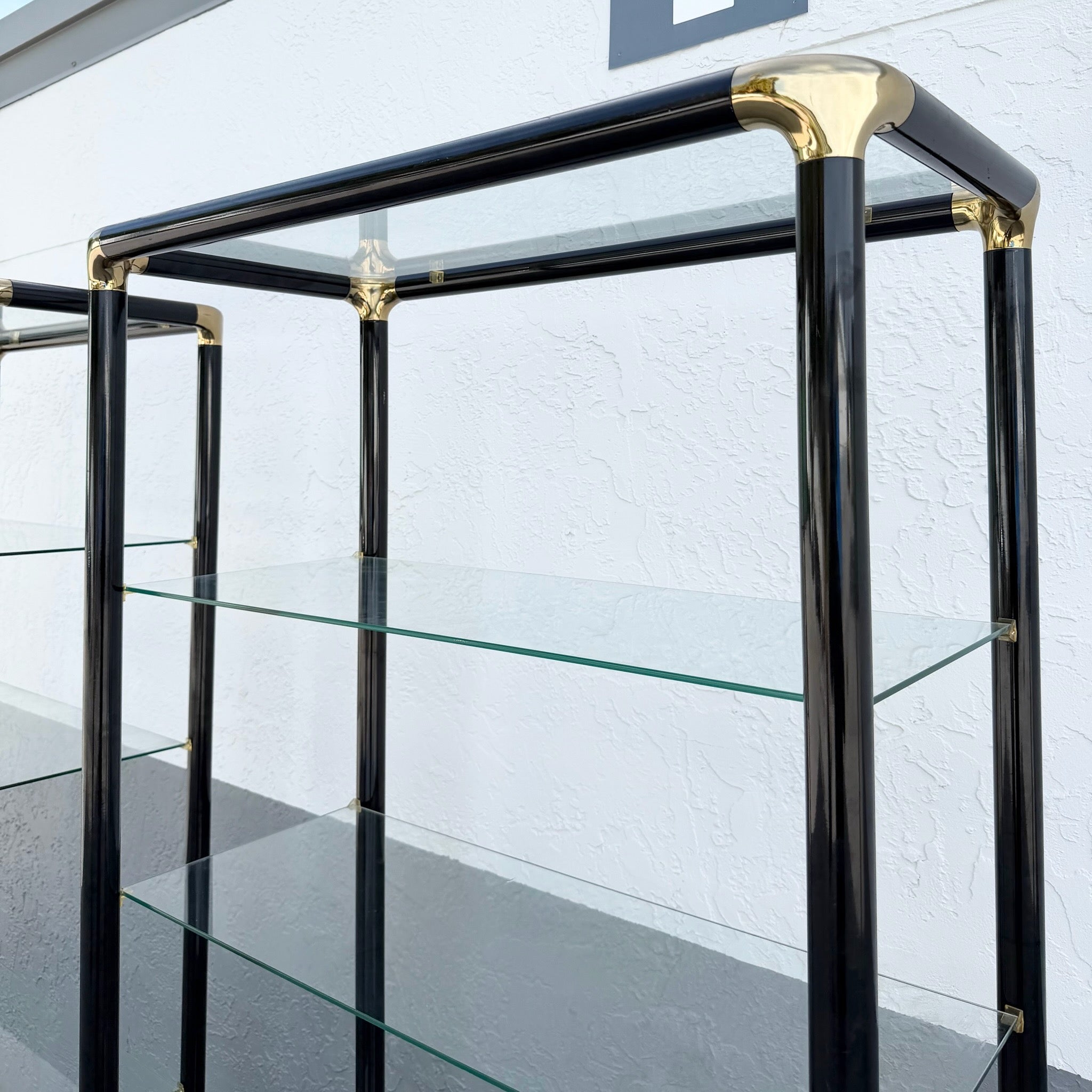 Art Deco Black Lacquered Etagere With Gold Accents and Glass Shelves - A Pair Dolphin & Flamingo