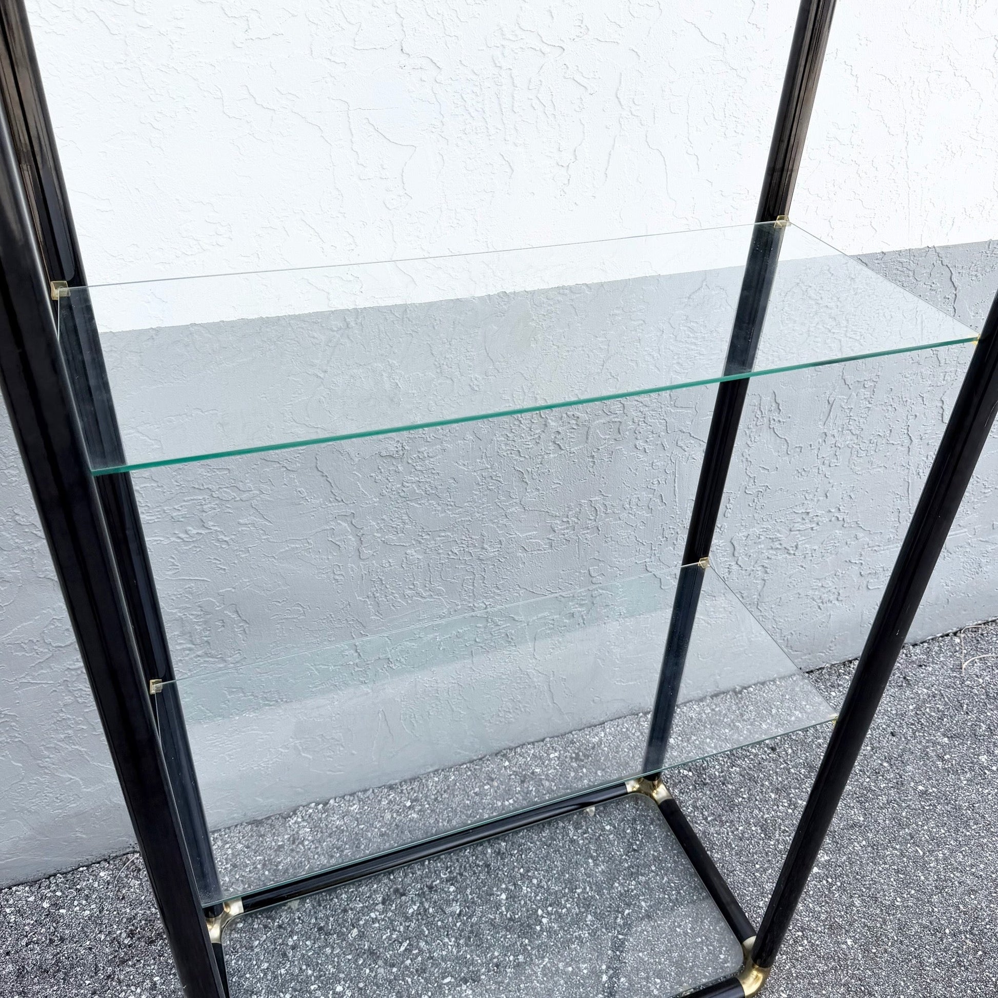 Art Deco Black Lacquered Etagere With Gold Accents and Glass Shelves - A Pair Dolphin & Flamingo