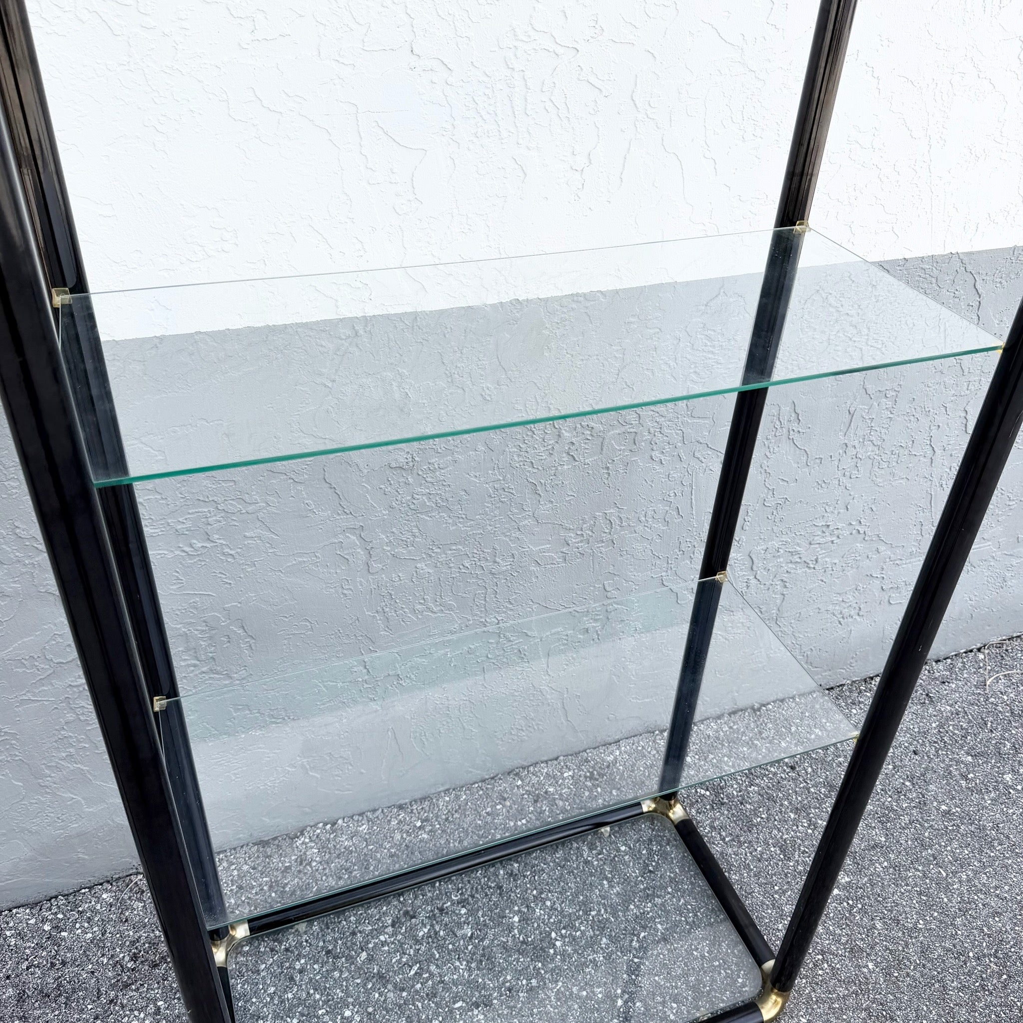Art Deco Black Lacquered Etagere With Gold Accents and Glass Shelves - A Pair Dolphin & Flamingo