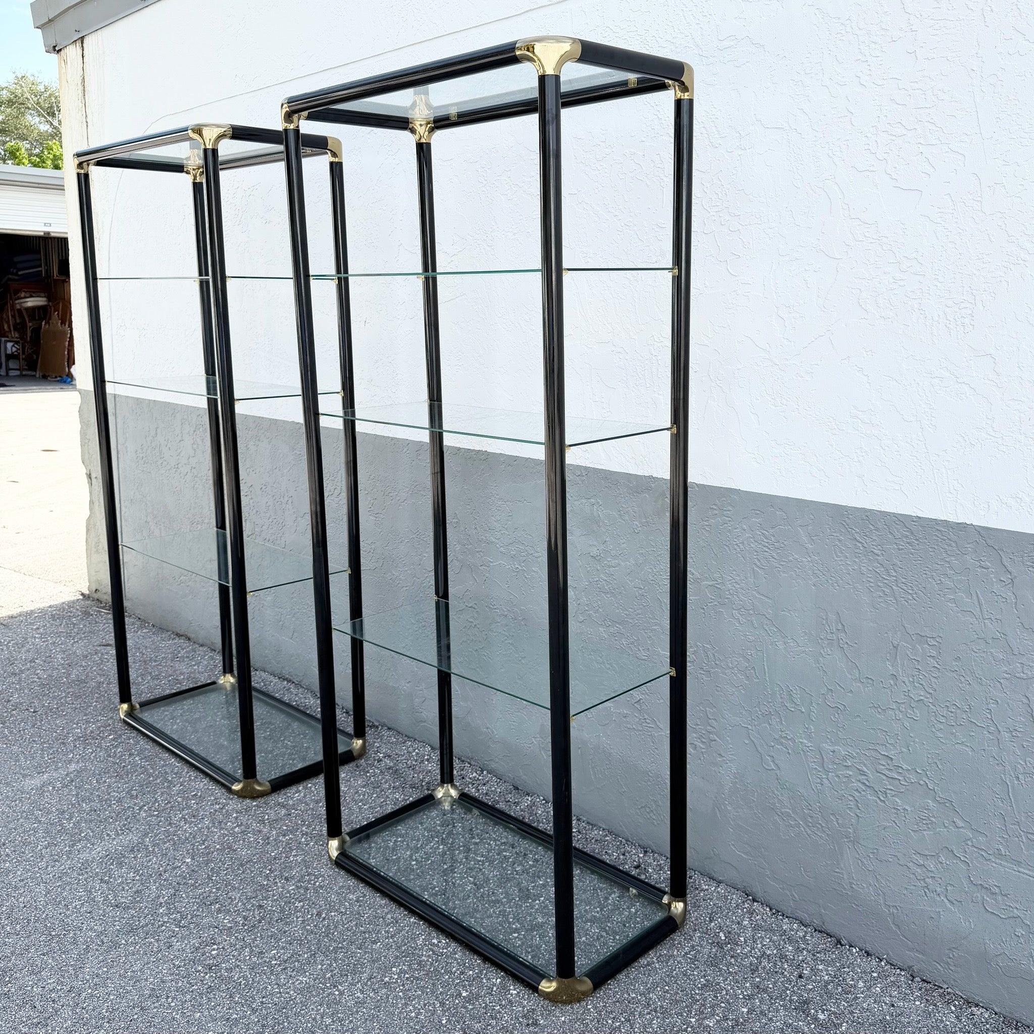 Art Deco Black Lacquered Etagere With Gold Accents and Glass Shelves - A Pair Dolphin & Flamingo
