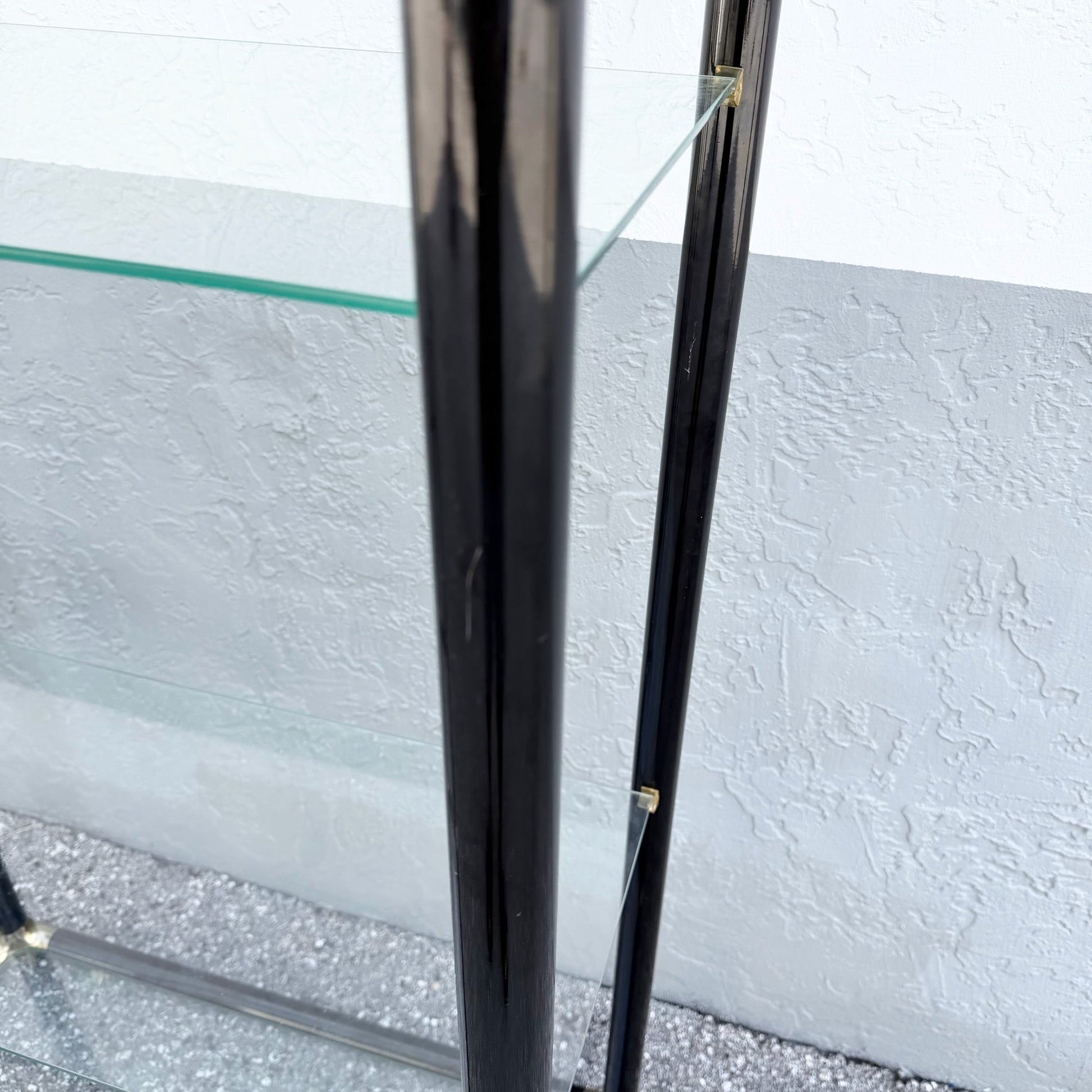 Art Deco Black Lacquered Etagere With Gold Accents and Glass Shelves - A Pair Dolphin & Flamingo
