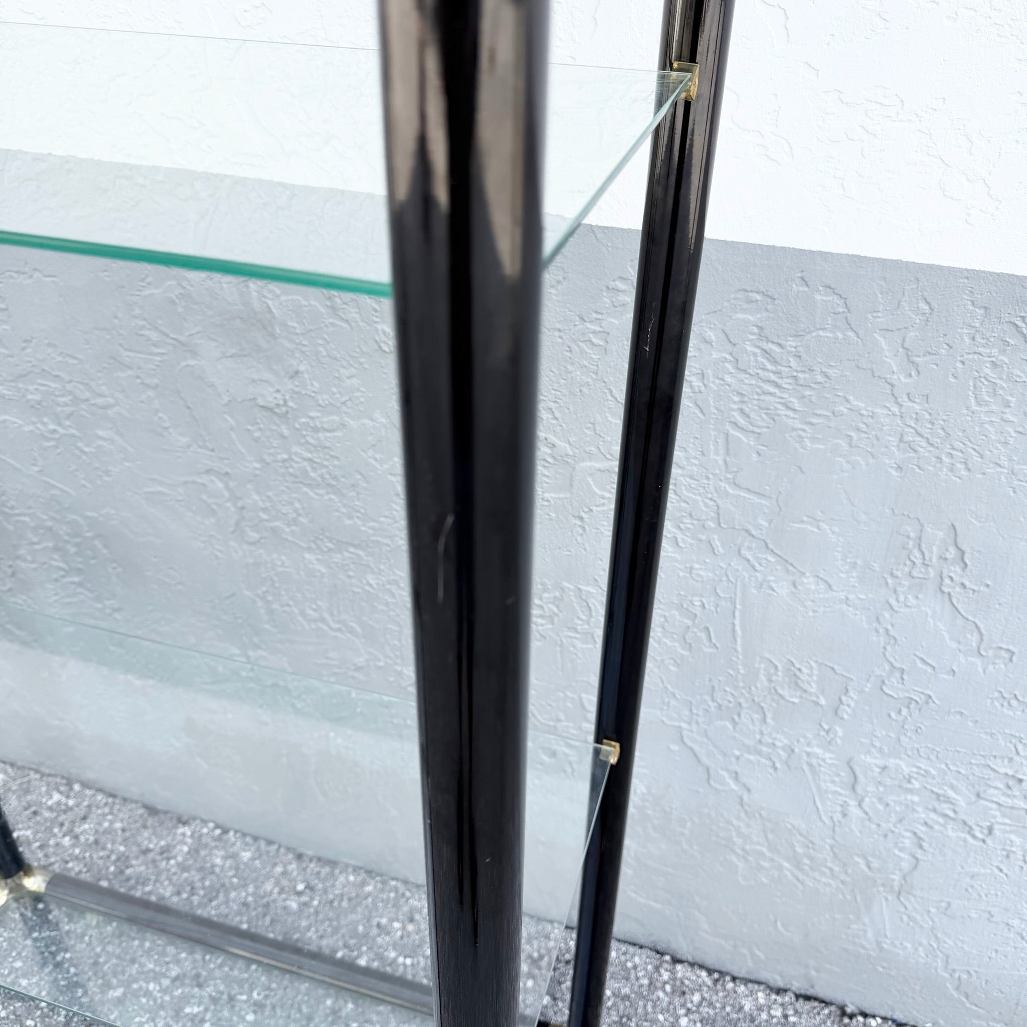Art Deco Black Lacquered Etagere With Gold Accents and Glass Shelves - A Pair Dolphin & Flamingo