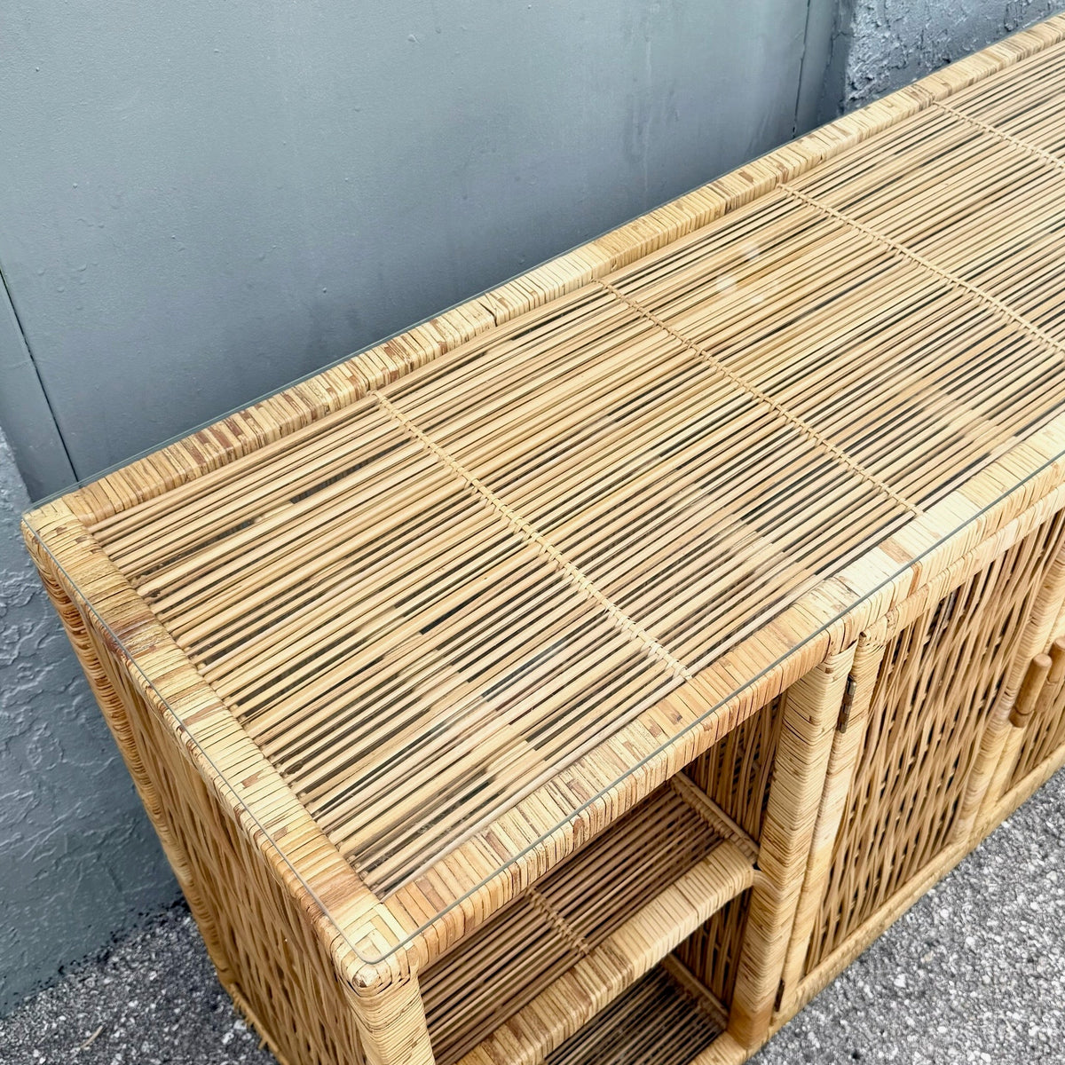 Boho Chic Wicker Wrapped Credenza With Glass Top Dolphin & Flamingo