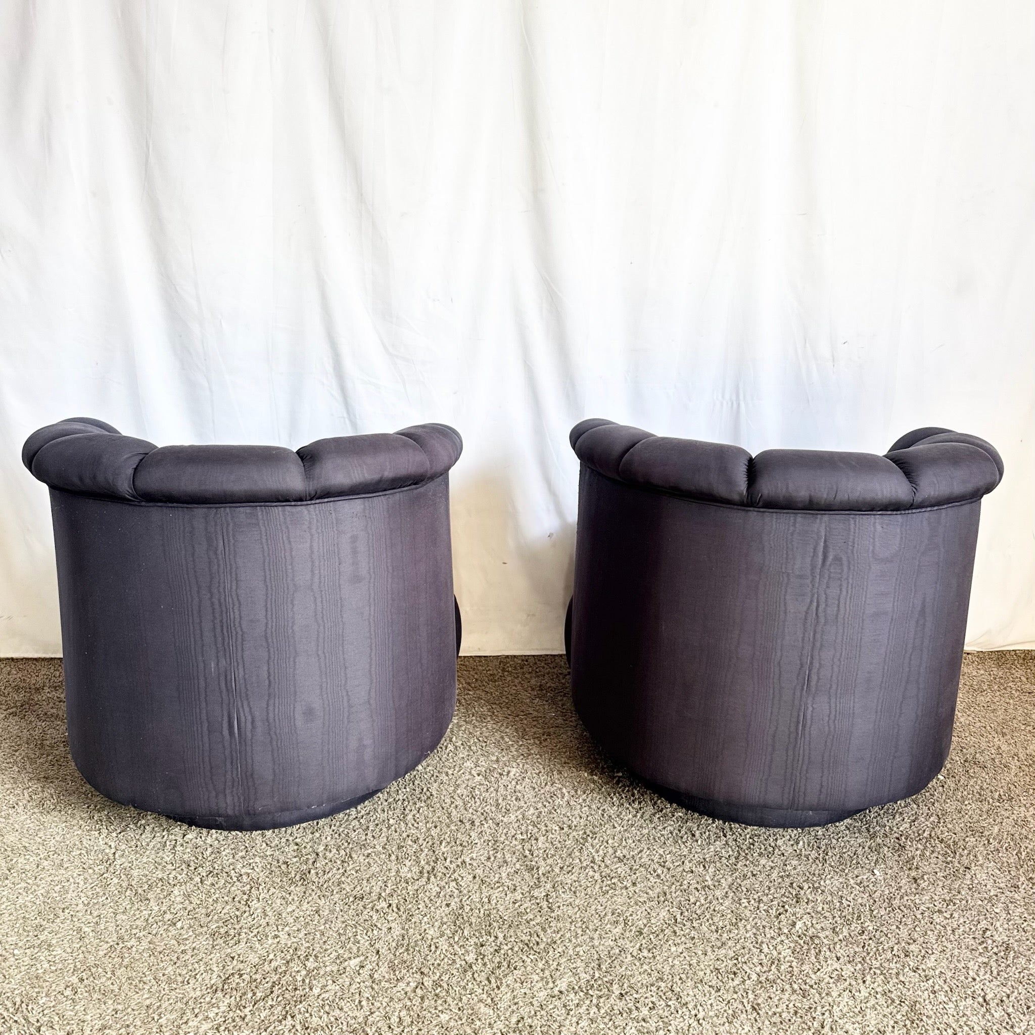 Postmodern Black Clam Shells Swivel Lounge Chairs - A Pair
