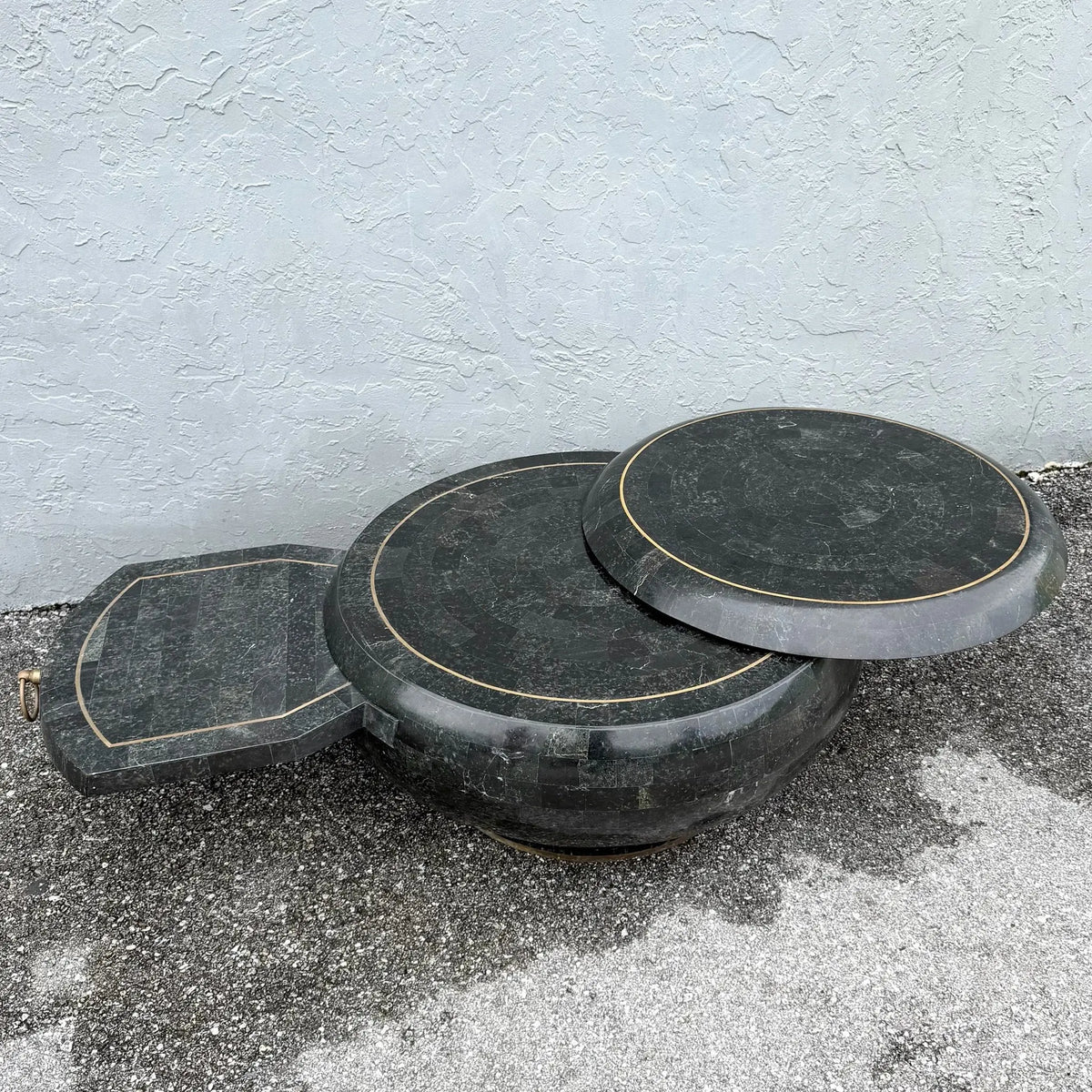Postmodern Black Tessellated Stone Swivel Top Coffee Table With Extension and Brass Inlay Dolphin & Flamingo