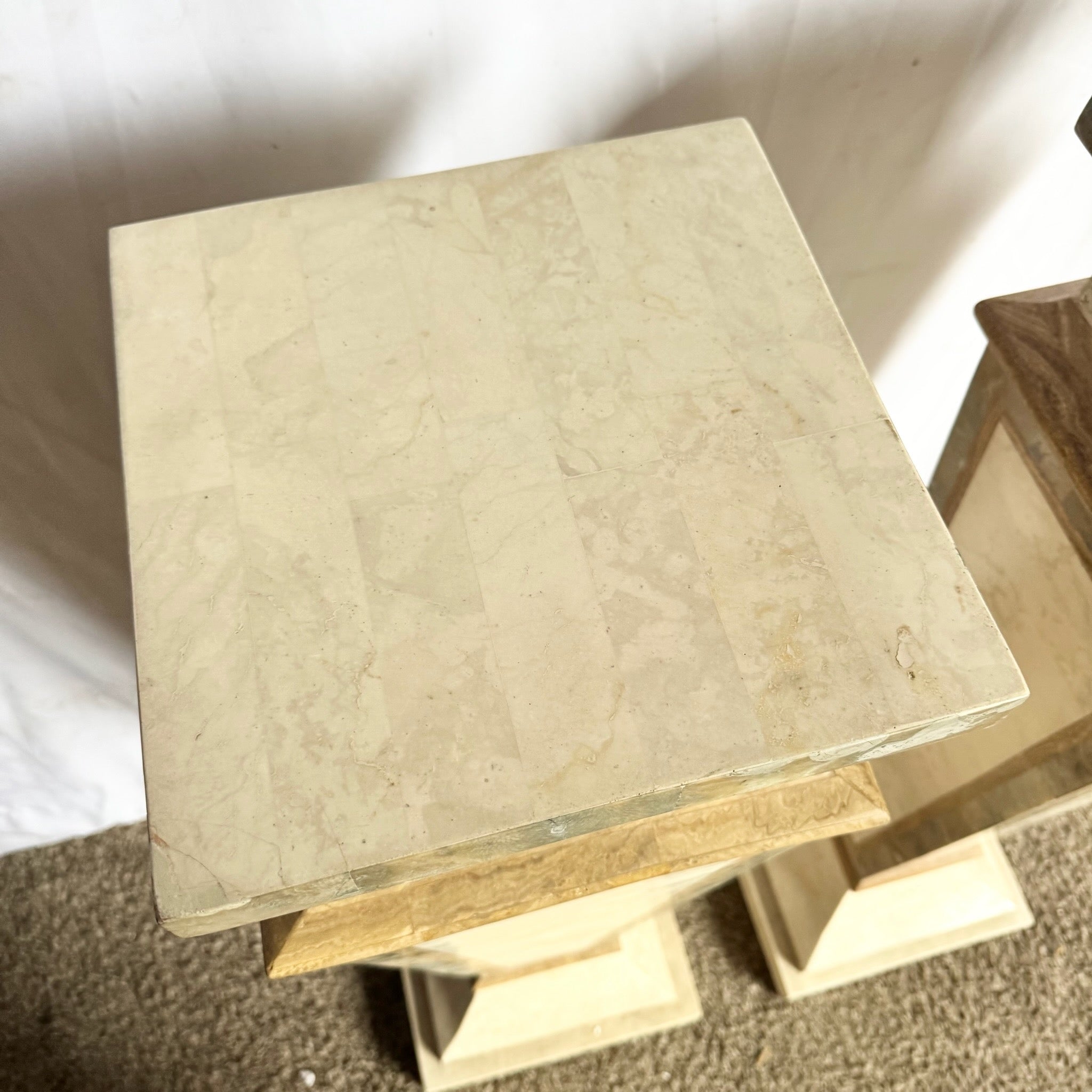 Postmodern Sculpted Tessellated Stone Pedestals - A Pair Dolphin & Flamingo