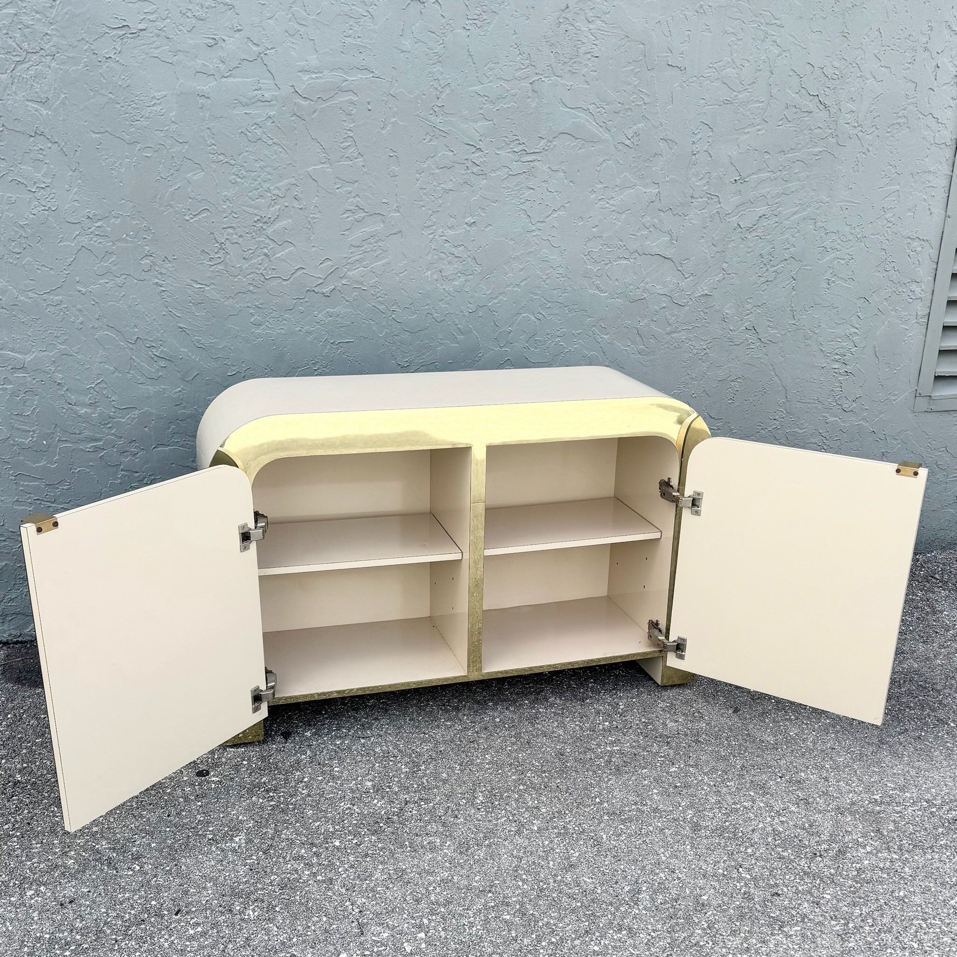 Postmodern Beige Gloss Laminate Mirrored and Gold Waterfall Credenza/Sideboard Dolphin & Flamingo