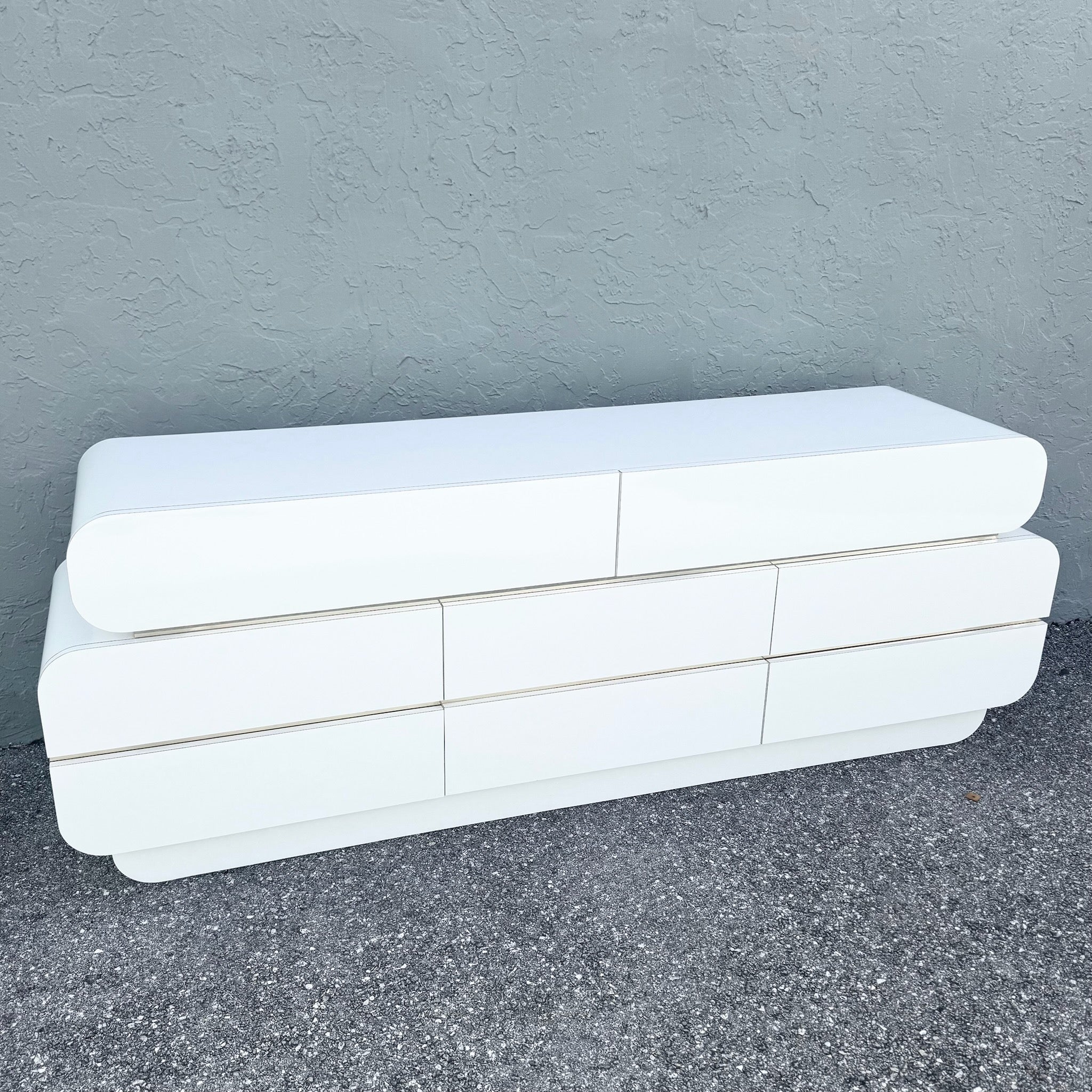 Postmodern Galactic White Gloss Laminate Waterfall Dresser With Gold Accents Dolphin & Flamingo