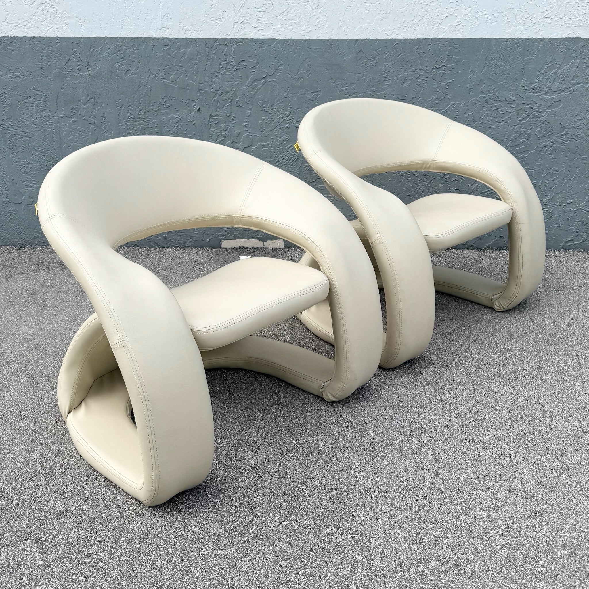 Postmodern Beige Faux Leather Tongue Chairs by Cheers - A Pair Dolphin & Flamingo