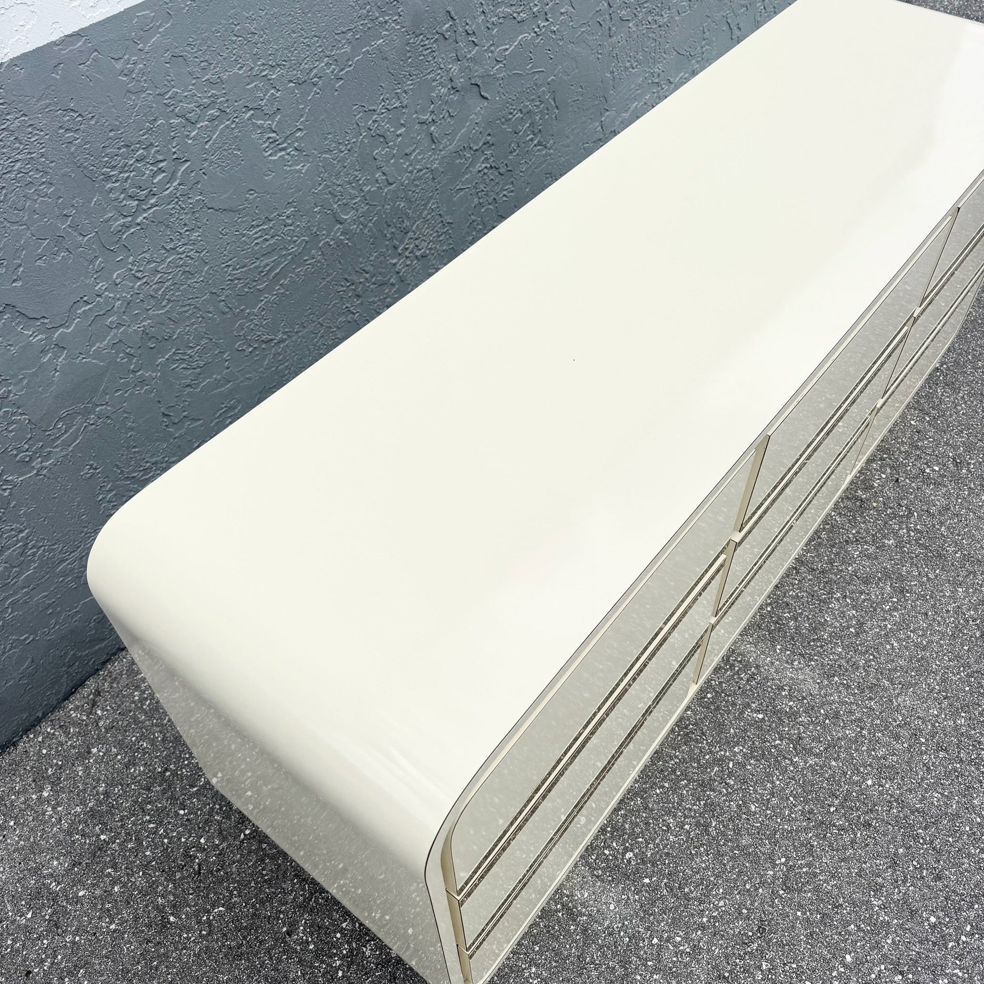 Postmodern Cream Gloss Laminate Waterfall Dresser With Gold Accents Dolphin & Flamingo