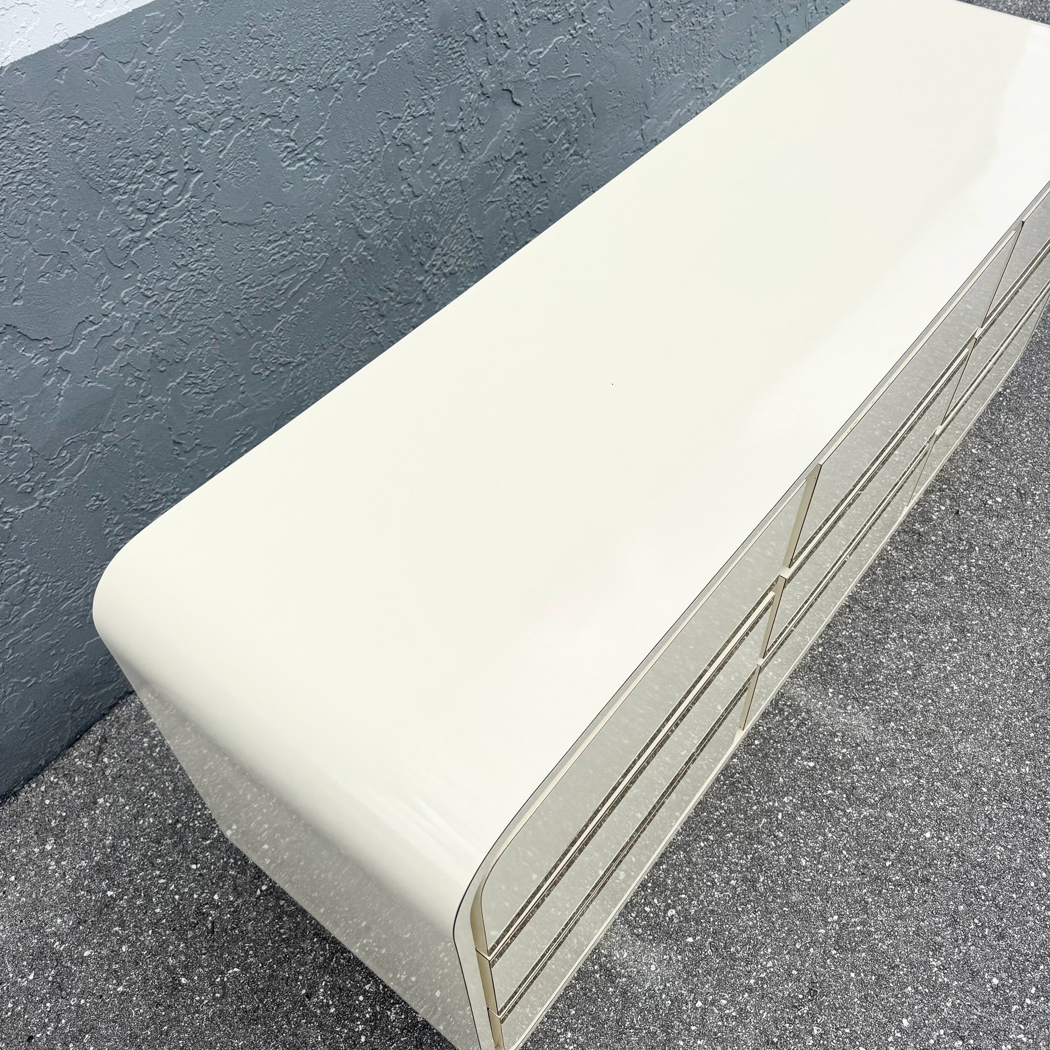 Postmodern Cream Gloss Laminate Waterfall Dresser With Gold Accents Dolphin & Flamingo