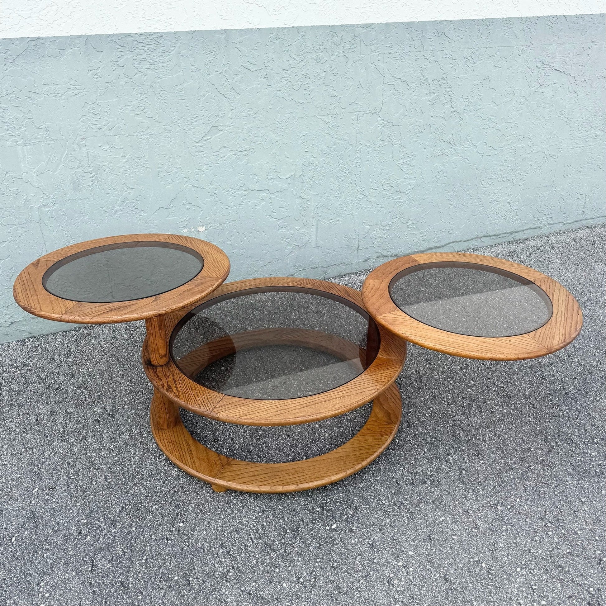 Mid Century Modern Three Tier Oak and Smoked Glass Swivel Coffee Table Dolphin & Flamingo