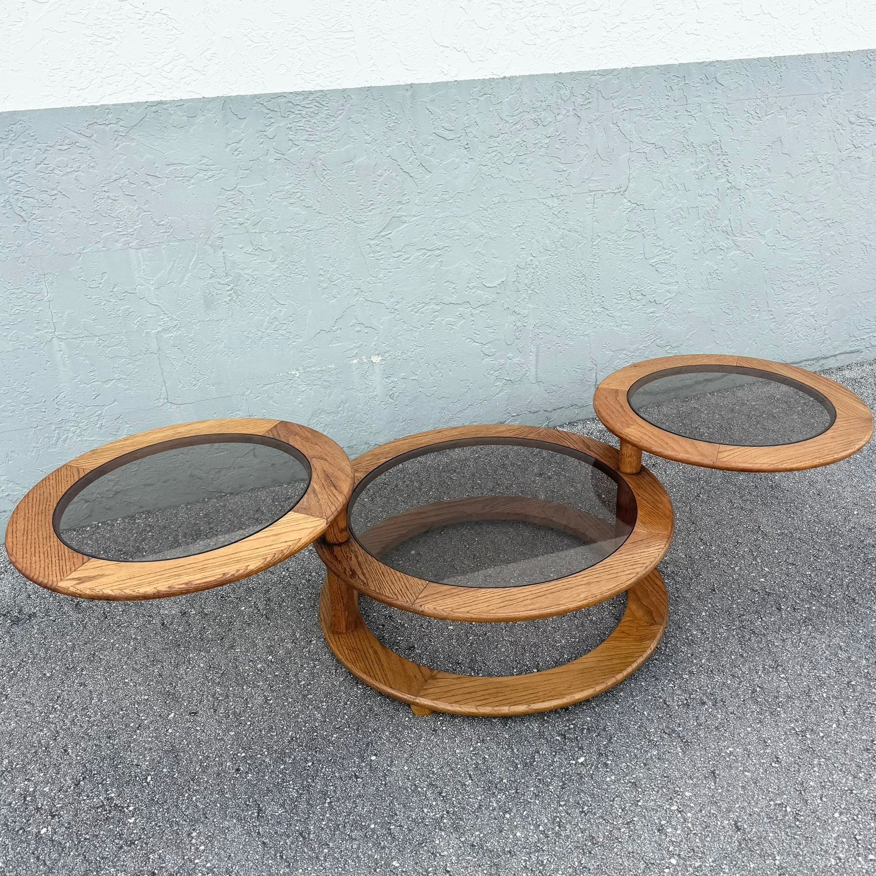Mid Century Modern Three Tier Oak and Smoked Glass Swivel Coffee Table Dolphin & Flamingo
