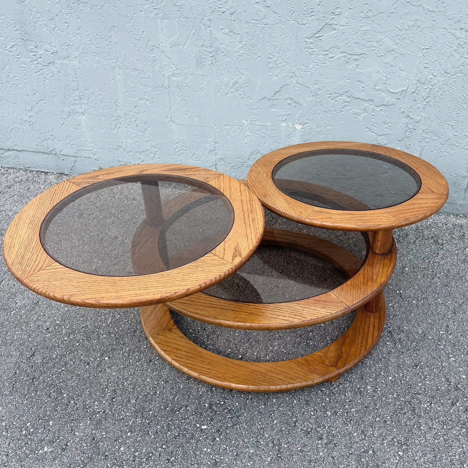 Mid Century Modern Three Tier Oak and Smoked Glass Swivel Coffee Table Dolphin & Flamingo