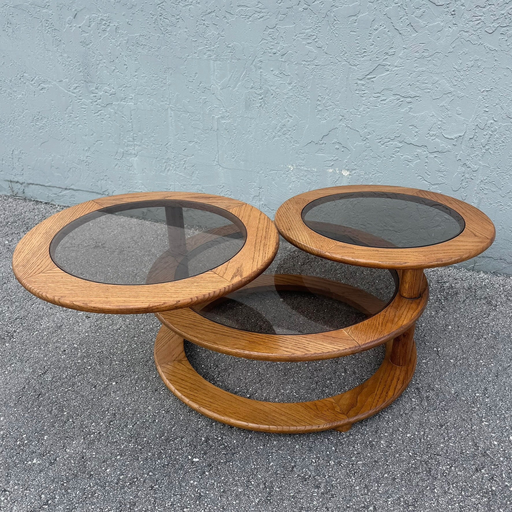 Mid Century Modern Three Tier Oak and Smoked Glass Swivel Coffee Table Dolphin & Flamingo
