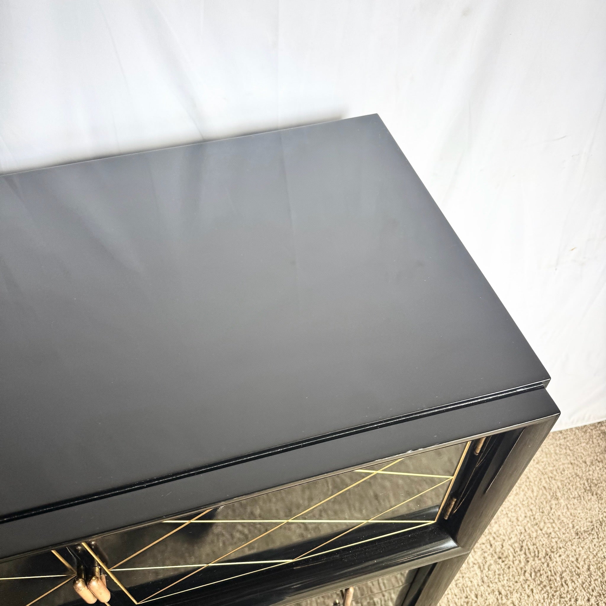 Art Deco Black Lacquered and Gold Highboy Dresser With Brass Hardware