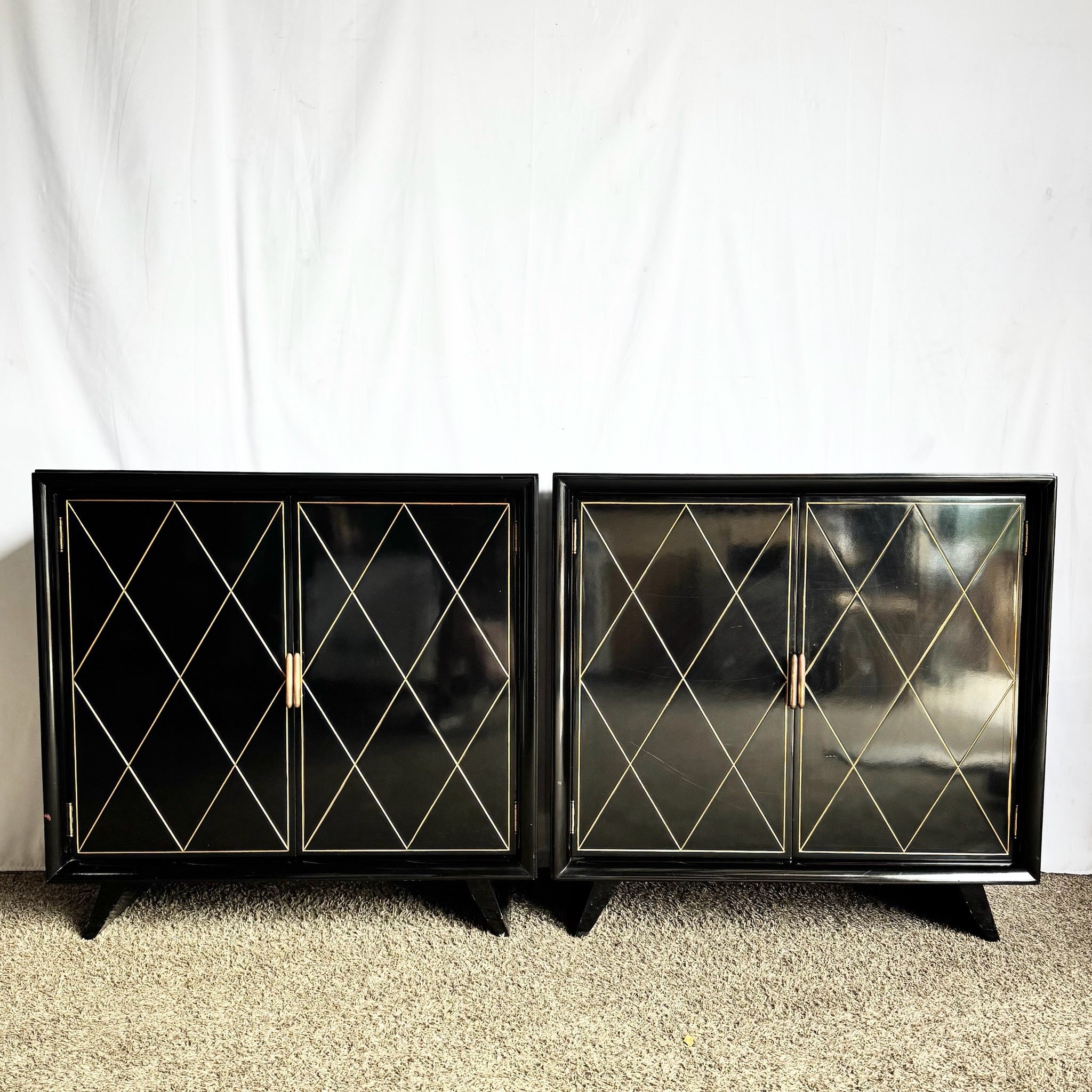 Art Deco Black Lacquered and Gold Chests of Drawers - A Pair