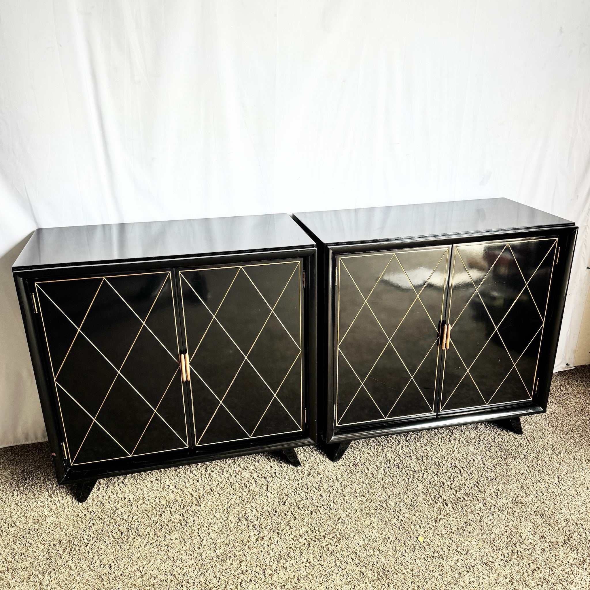 Art Deco Black Lacquered and Gold Chests of Drawers - A Pair
