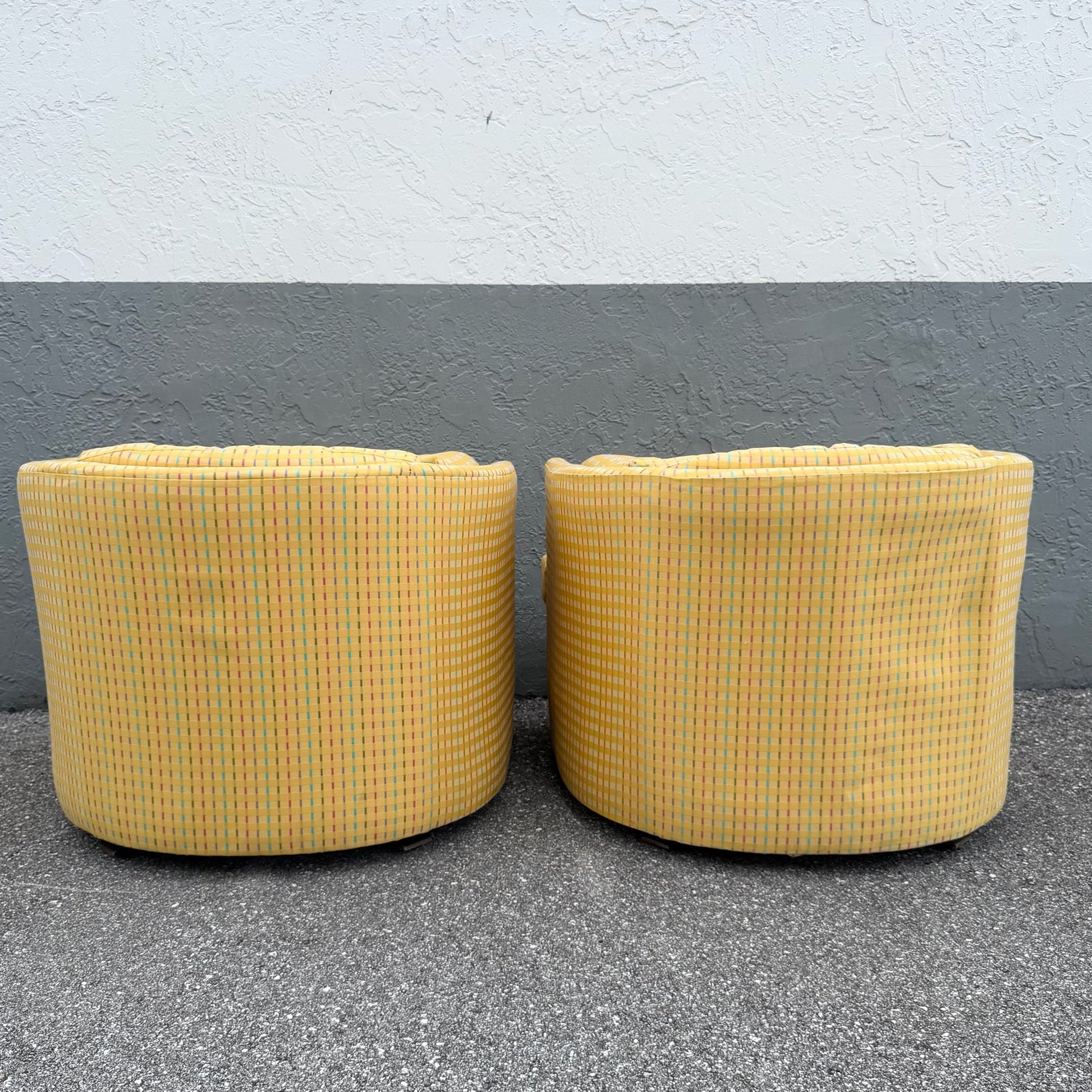 Vintage Mid Century Yellow Tufted Swivel Barrell Chairs With Pink Purple and Blue Stripes - A Pair Dolphin & Flamingo