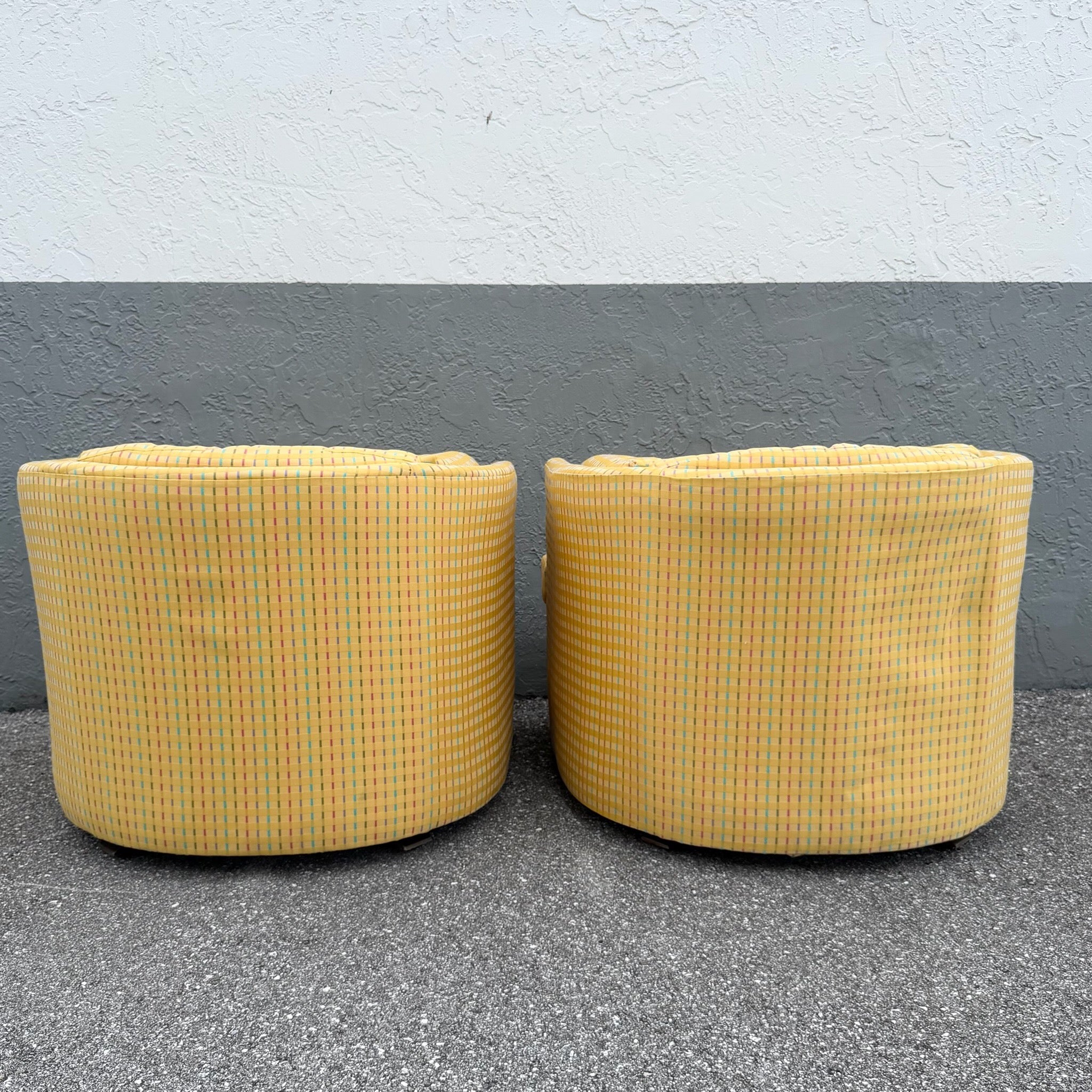 Vintage Mid Century Yellow Tufted Swivel Barrell Chairs With Pink Purple and Blue Stripes - A Pair Dolphin & Flamingo