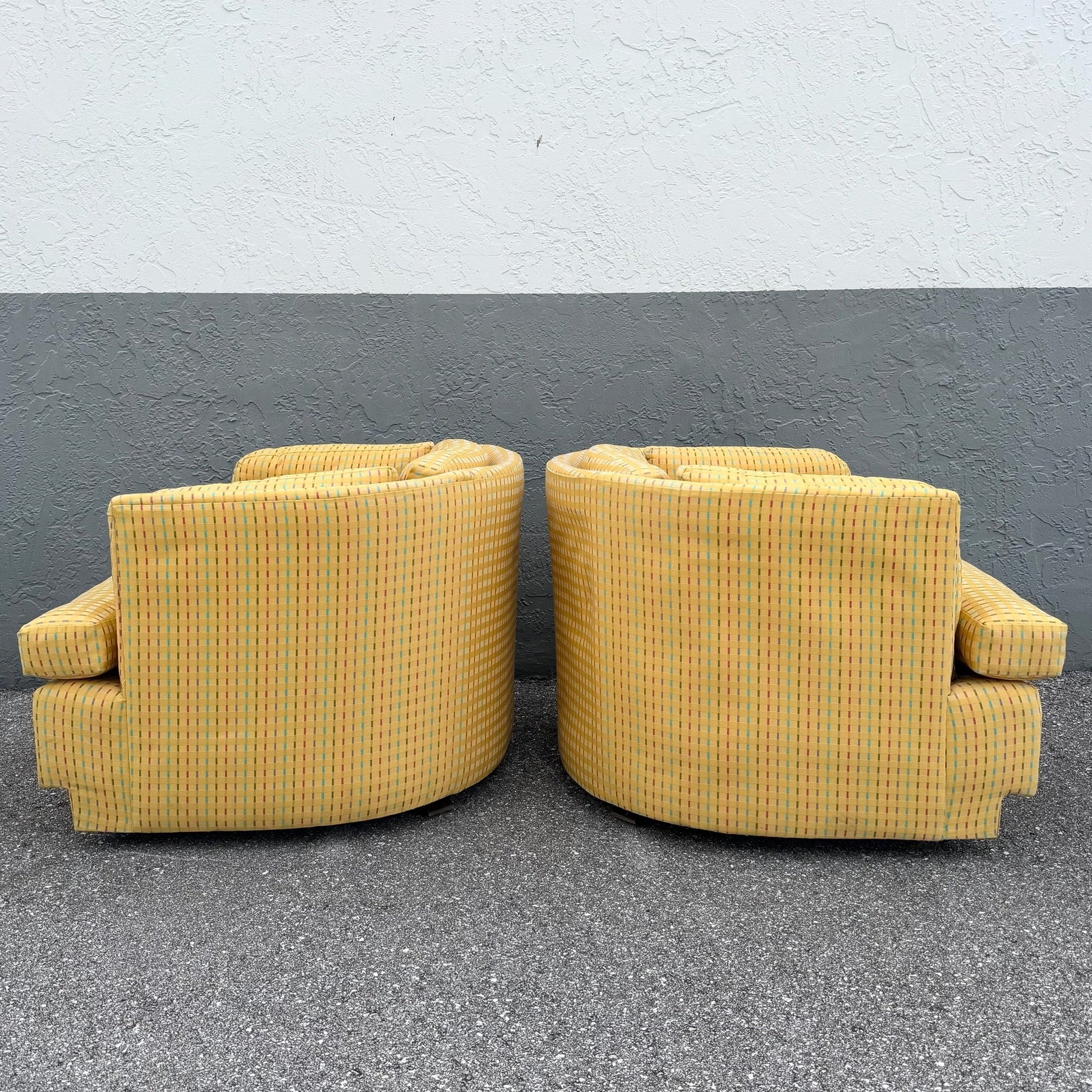 Vintage Mid Century Yellow Tufted Swivel Barrell Chairs With Pink Purple and Blue Stripes - A Pair Dolphin & Flamingo