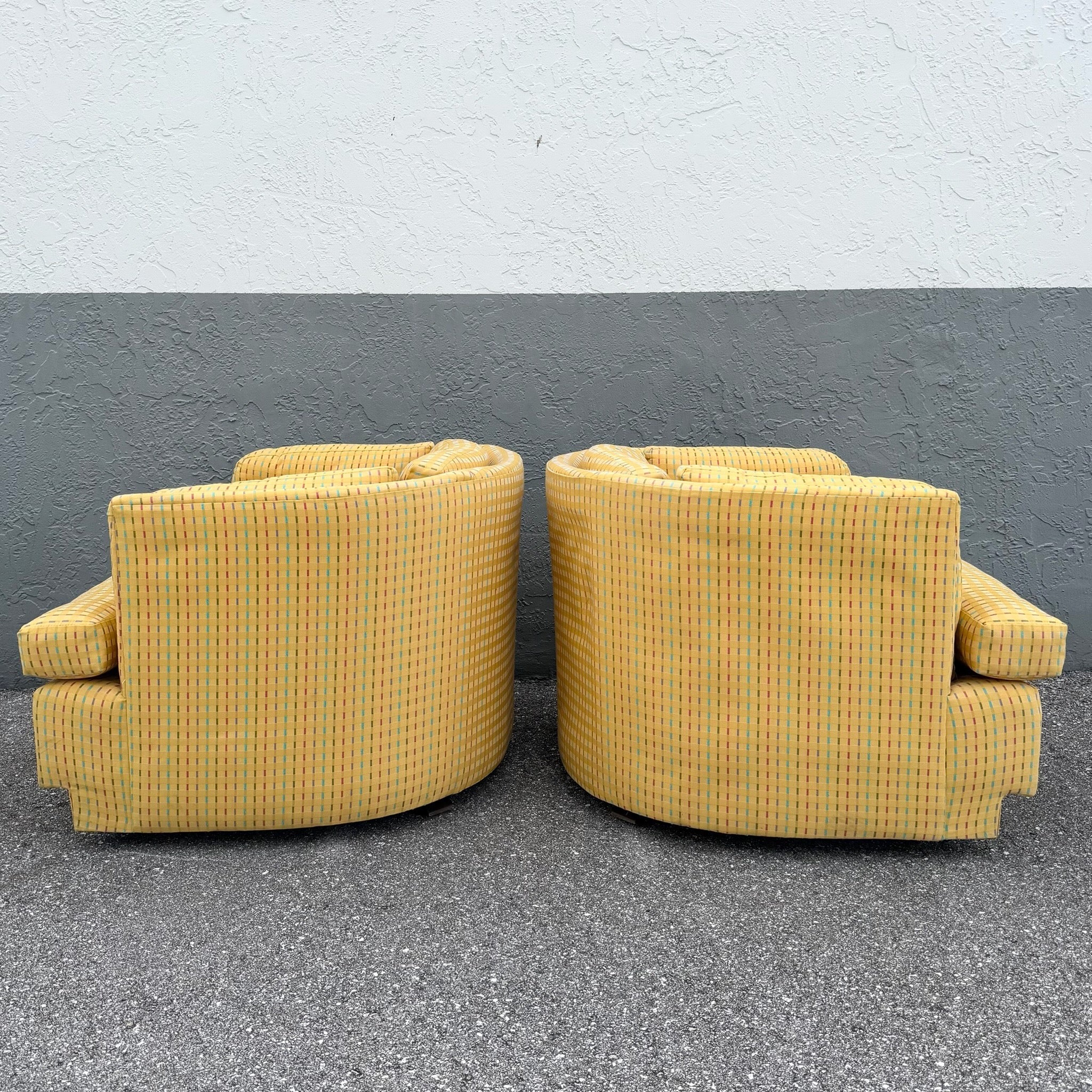 Vintage Mid Century Yellow Tufted Swivel Barrell Chairs With Pink Purple and Blue Stripes - A Pair Dolphin & Flamingo