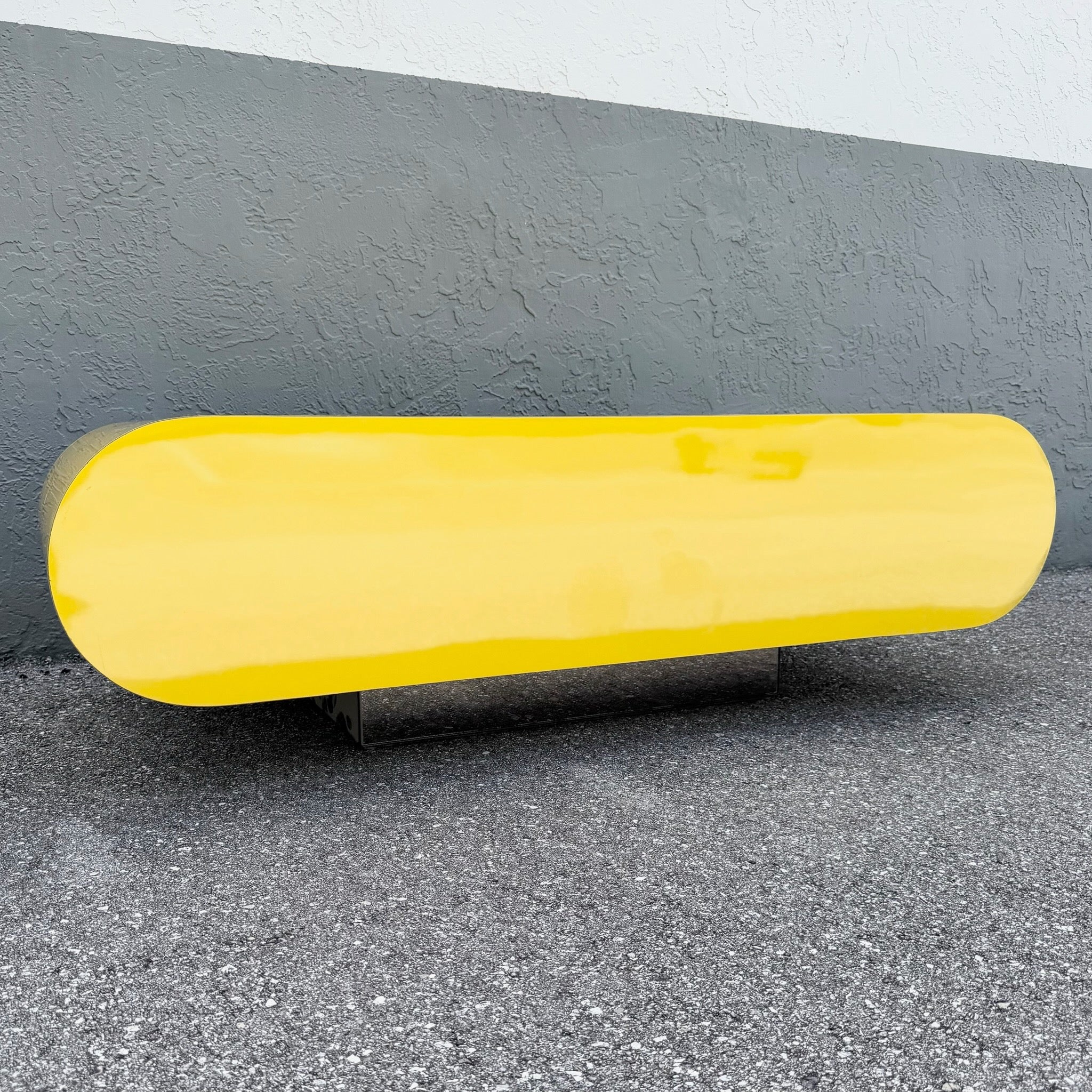 Postmodern Yellow Gloss Laminate Bullnose Coffee Table on Mirror Base Dolphin & Flamingo