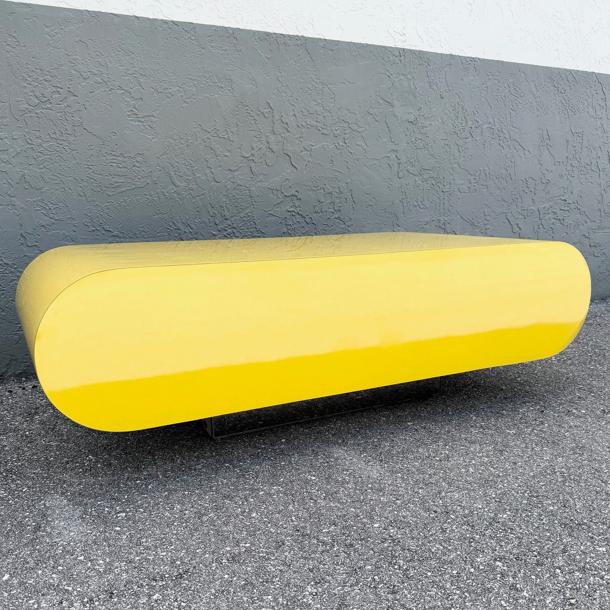 Postmodern Yellow Gloss Laminate Bullnose Coffee Table on Mirror Base Dolphin & Flamingo
