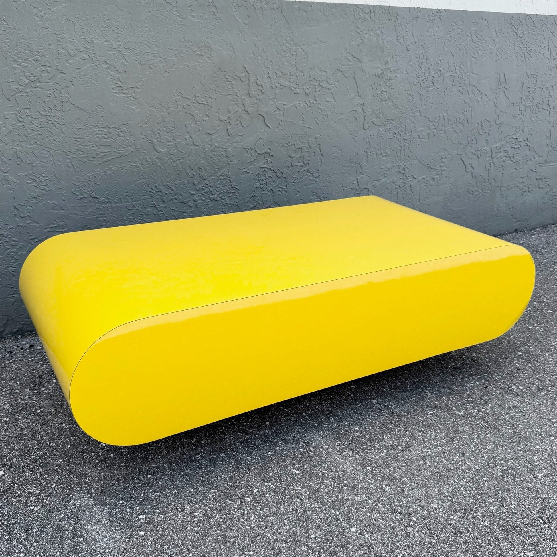 Postmodern Yellow Gloss Laminate Bullnose Coffee Table on Mirror Base Dolphin & Flamingo