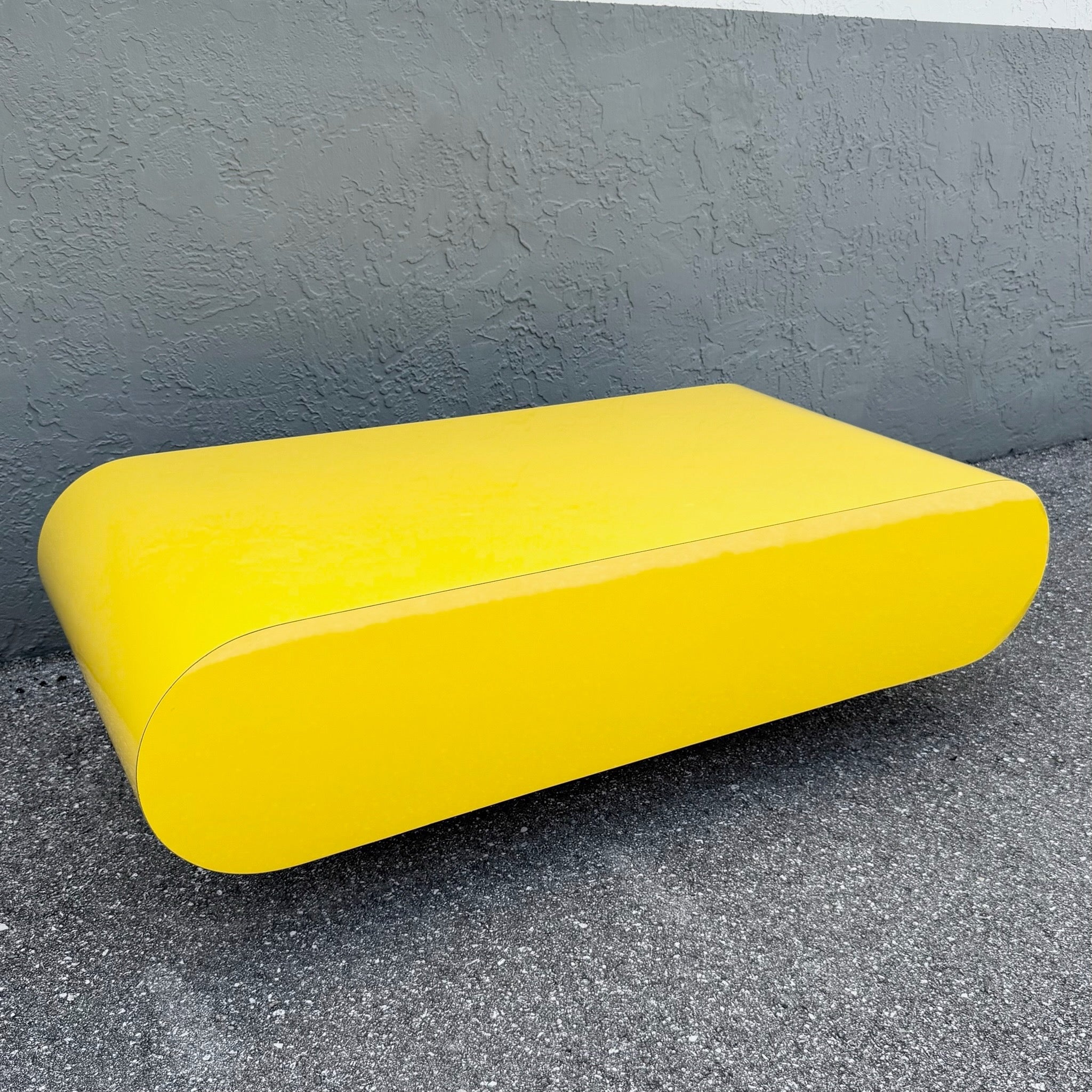 Postmodern Yellow Gloss Laminate Bullnose Coffee Table on Mirror Base Dolphin & Flamingo
