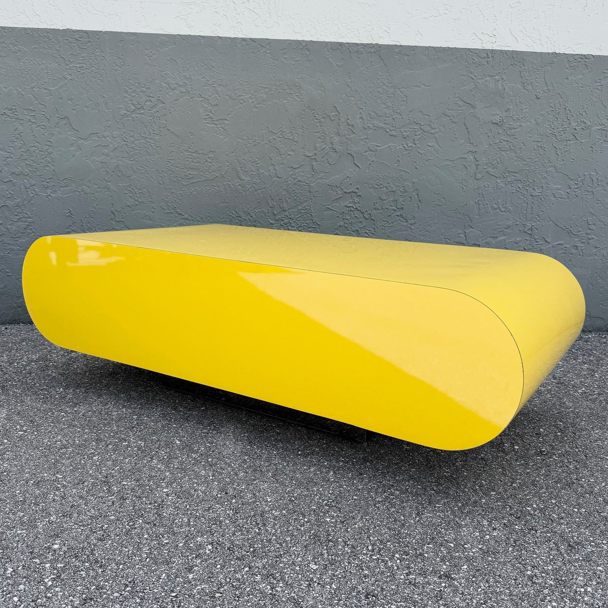 Postmodern Yellow Gloss Laminate Bullnose Coffee Table on Mirror Base Dolphin & Flamingo