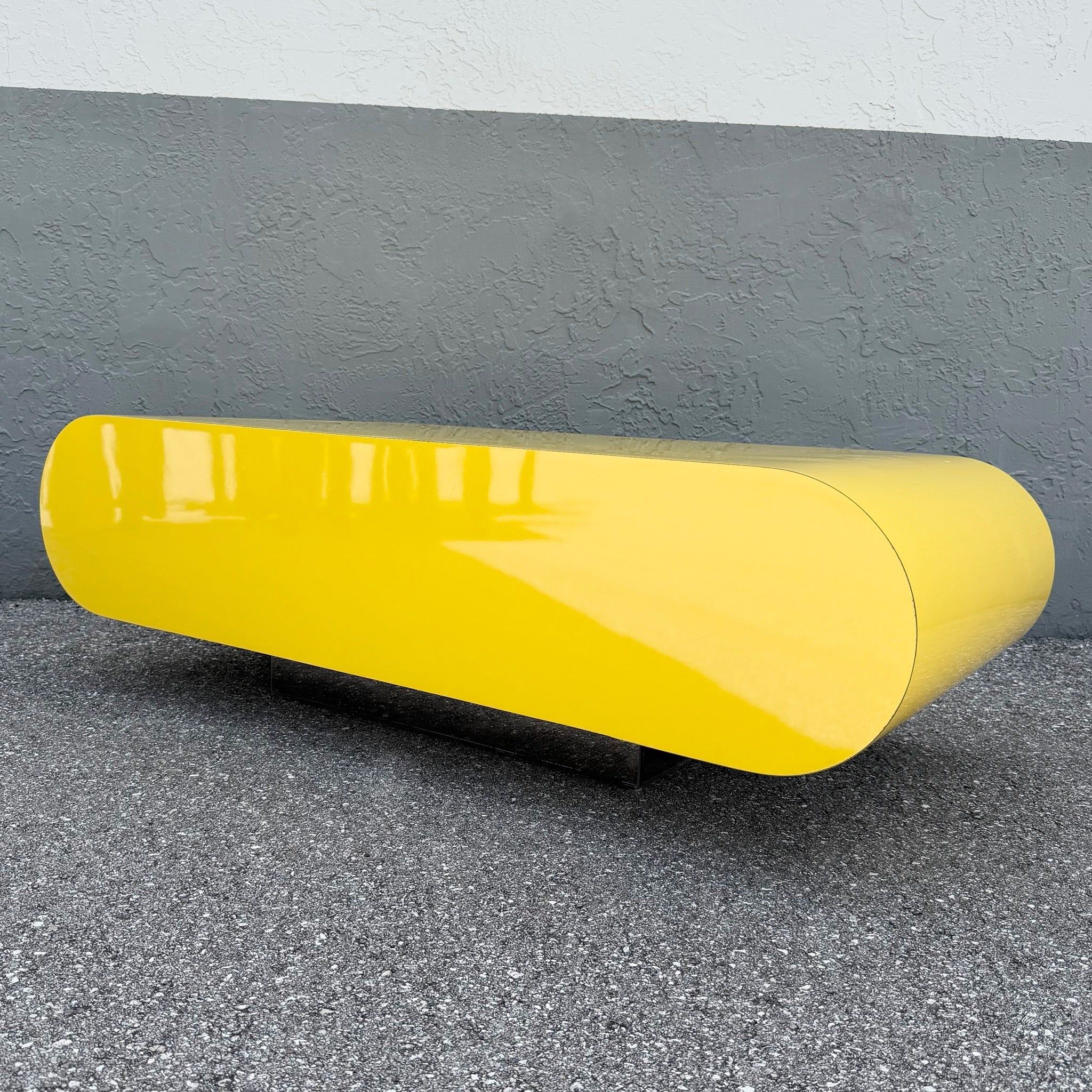 Postmodern Yellow Gloss Laminate Bullnose Coffee Table on Mirror Base Dolphin & Flamingo