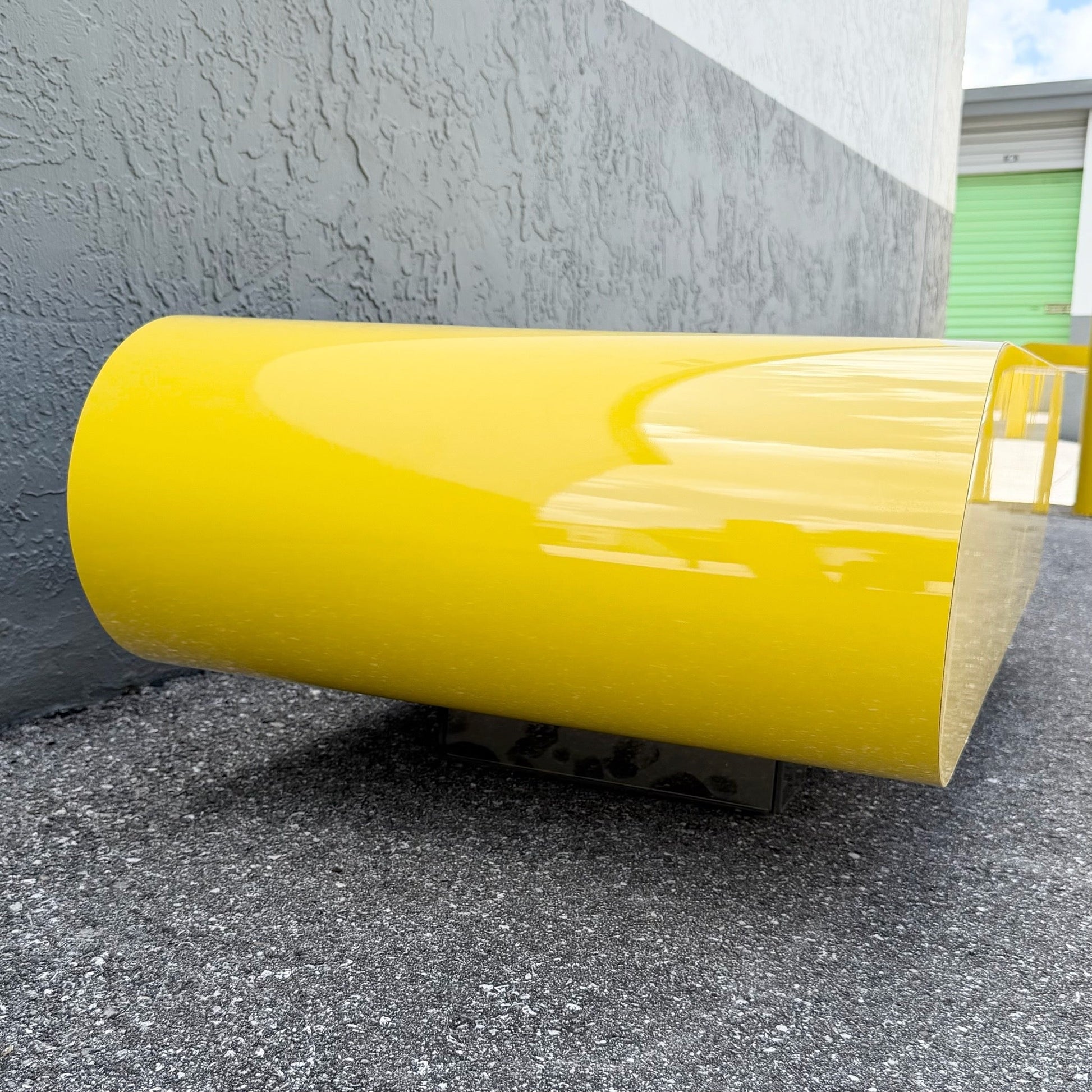 Postmodern Yellow Gloss Laminate Bullnose Coffee Table on Mirror Base Dolphin & Flamingo