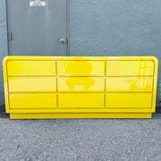 Postmodern Yellow Gloss Laminate Waterfall Dresser - 9 Drawers Dolphin & Flamingo