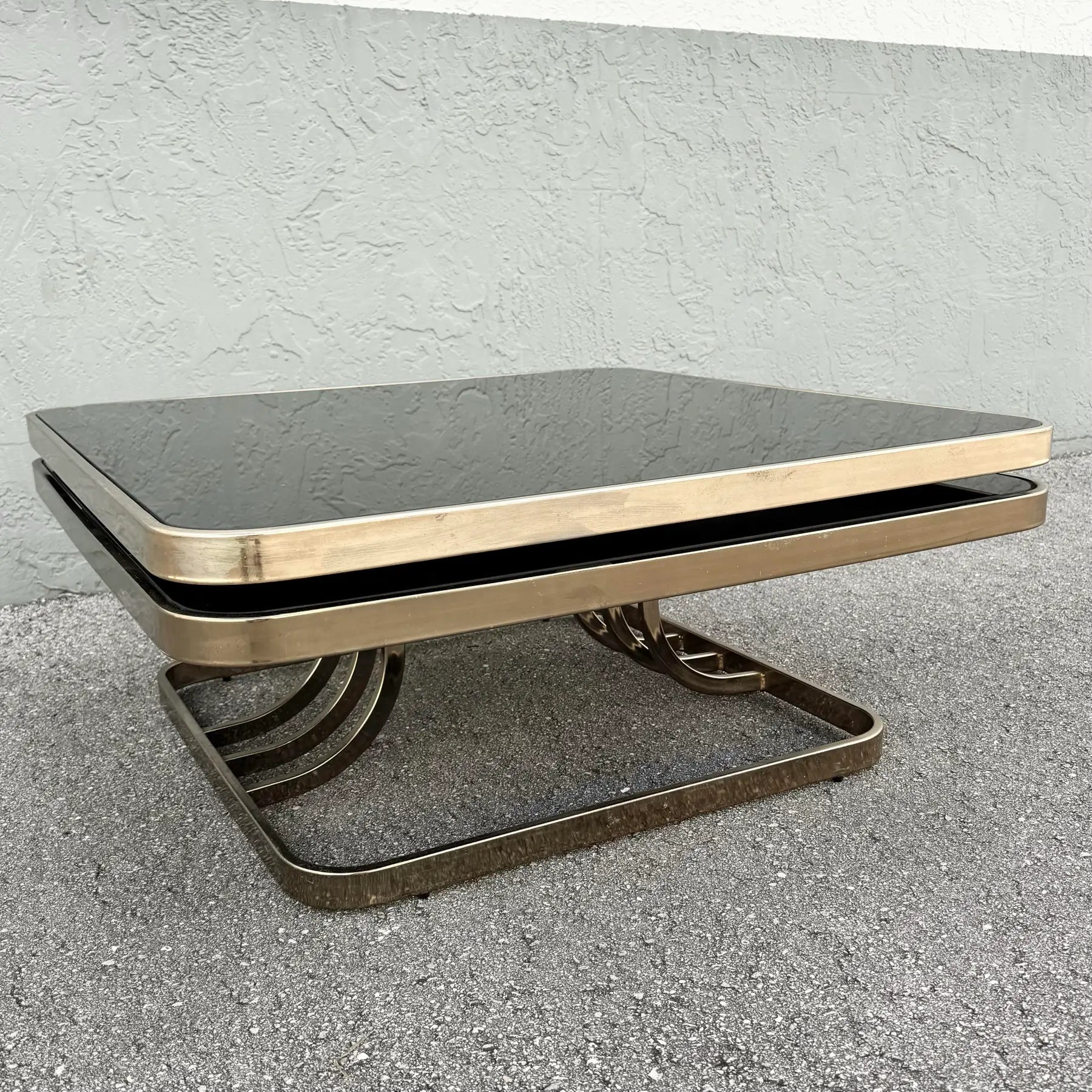 Art Deco Gold and Black Glass Swivel Top Two Tier Coffee Table Dolphin & Flamingo