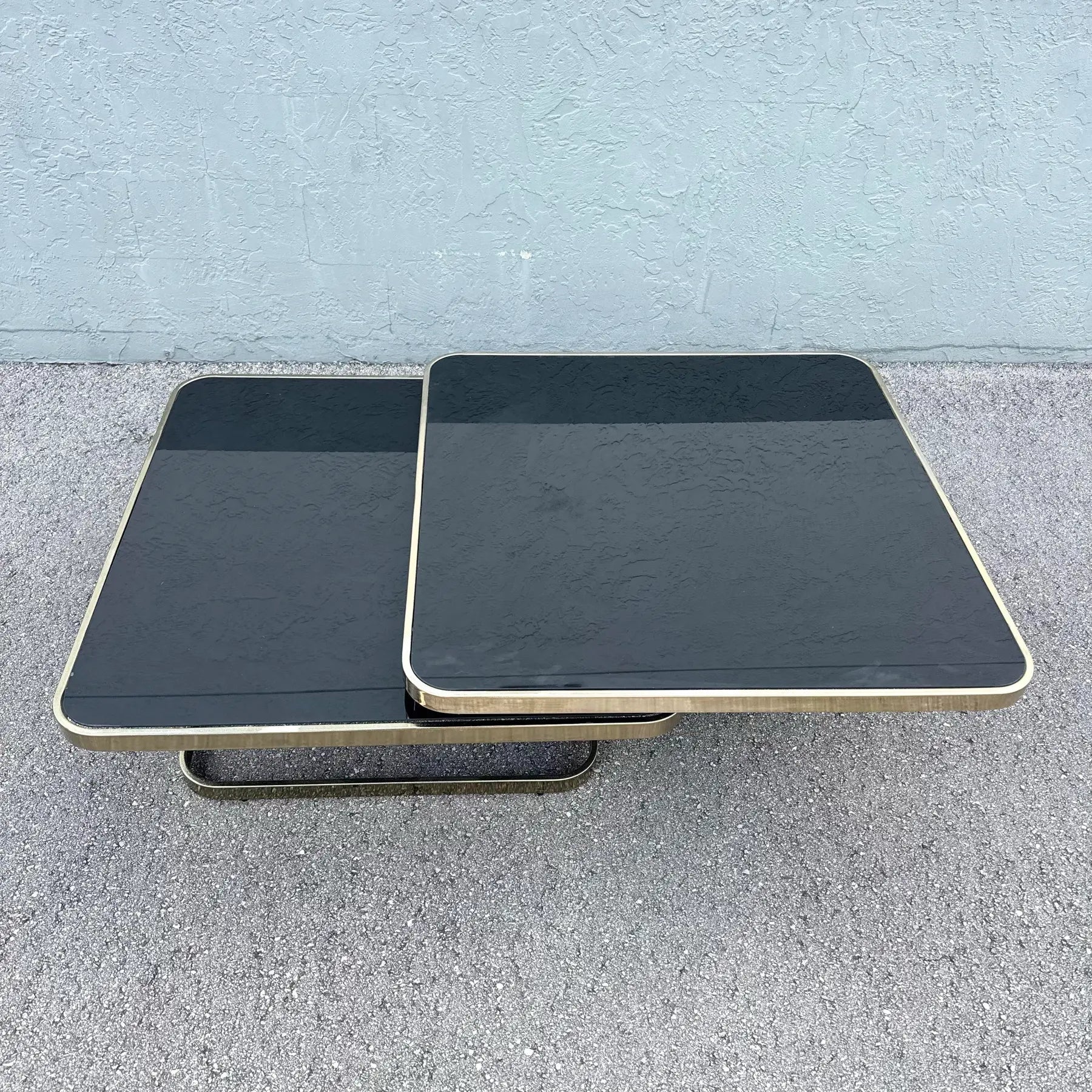 Art Deco Gold and Black Glass Swivel Top Two Tier Coffee Table Dolphin & Flamingo