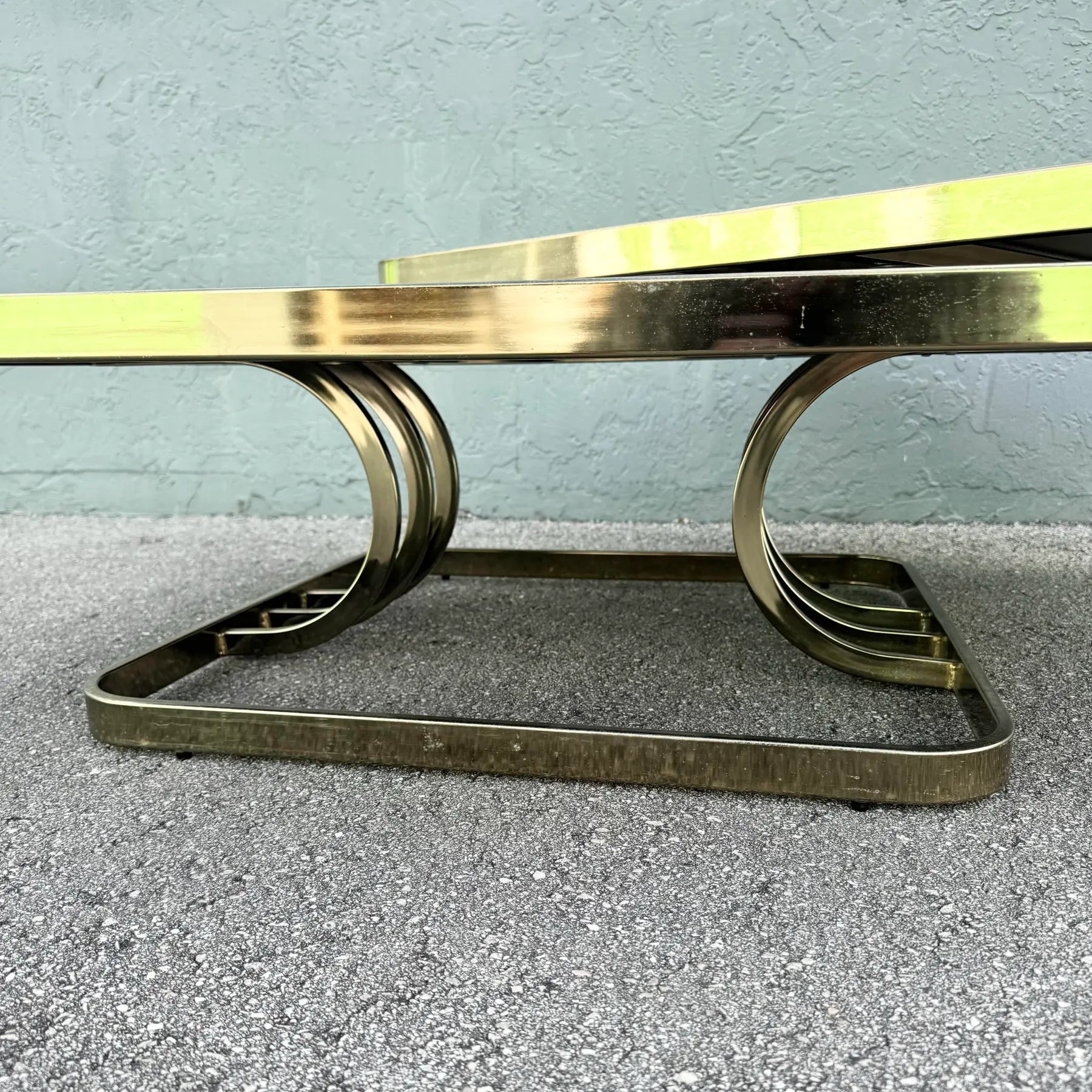 Art Deco Gold and Black Glass Swivel Top Two Tier Coffee Table Dolphin & Flamingo