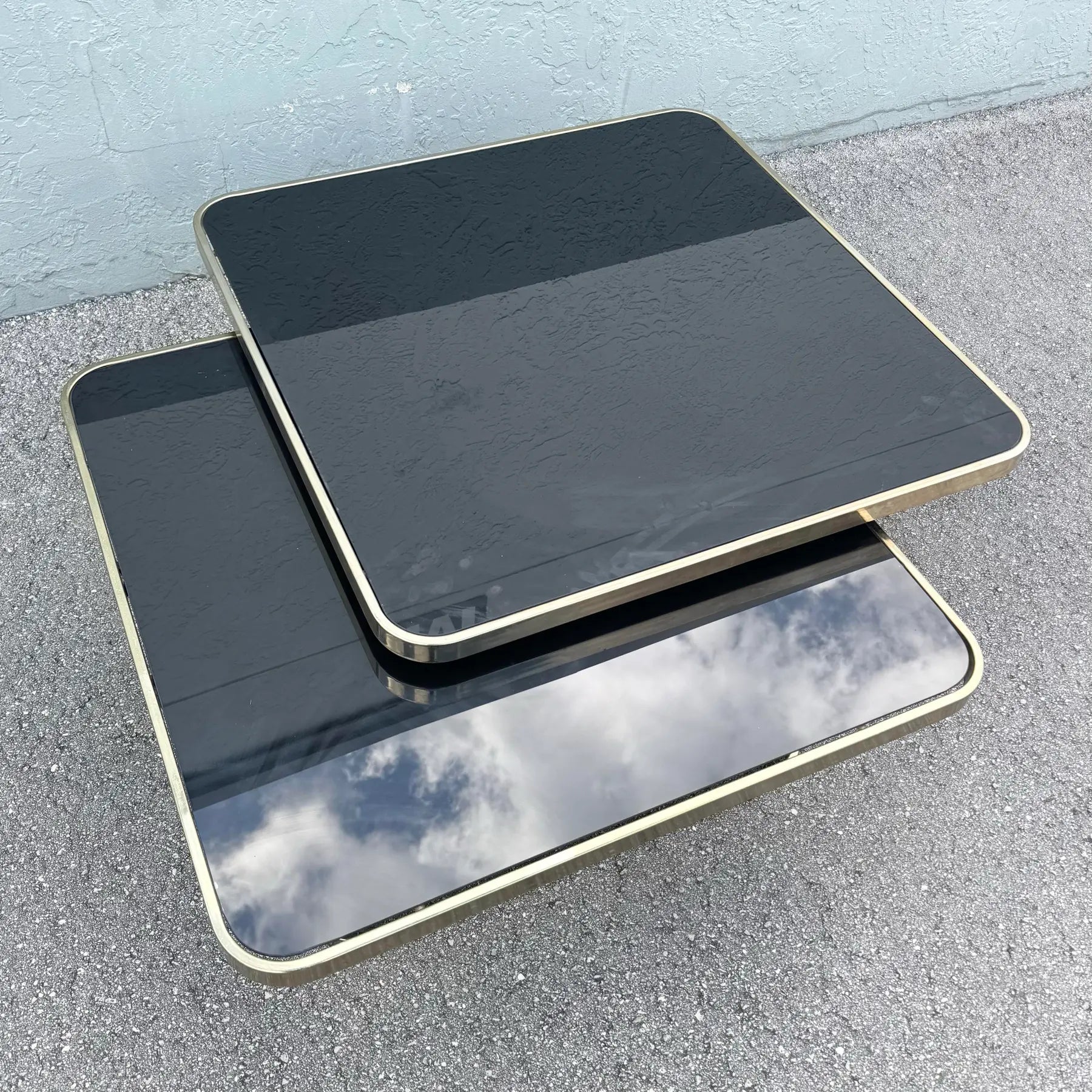 Art Deco Gold and Black Glass Swivel Top Two Tier Coffee Table Dolphin & Flamingo