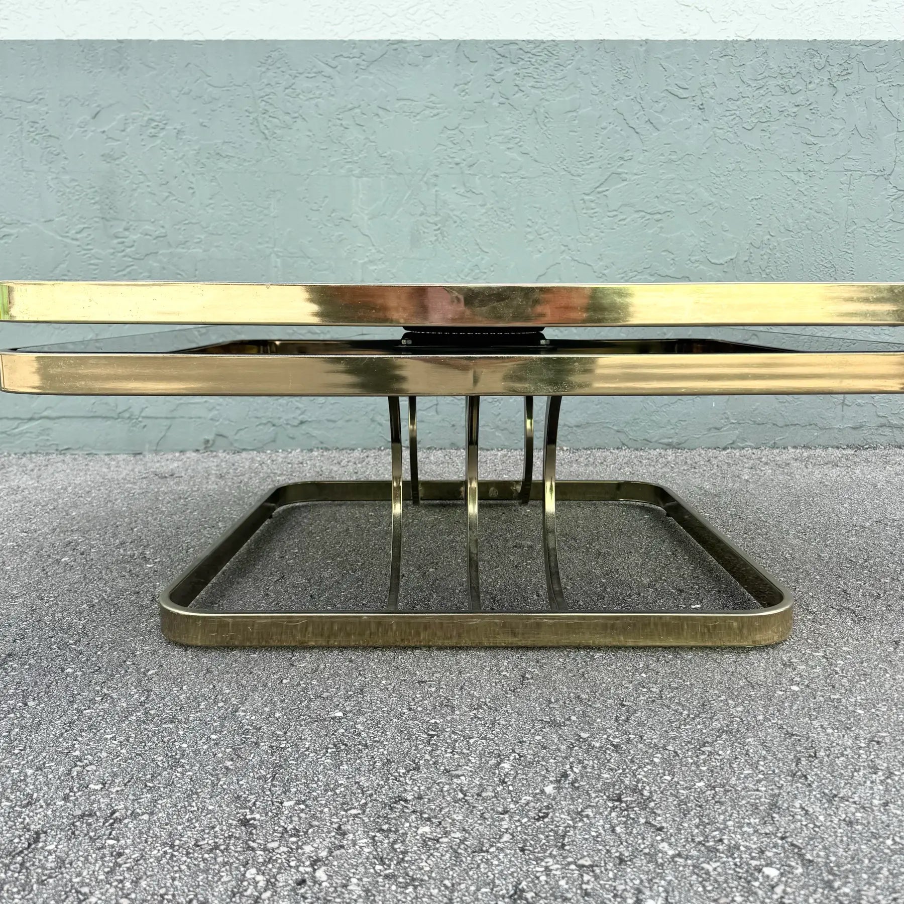 Art Deco Gold and Black Glass Swivel Top Two Tier Coffee Table Dolphin & Flamingo