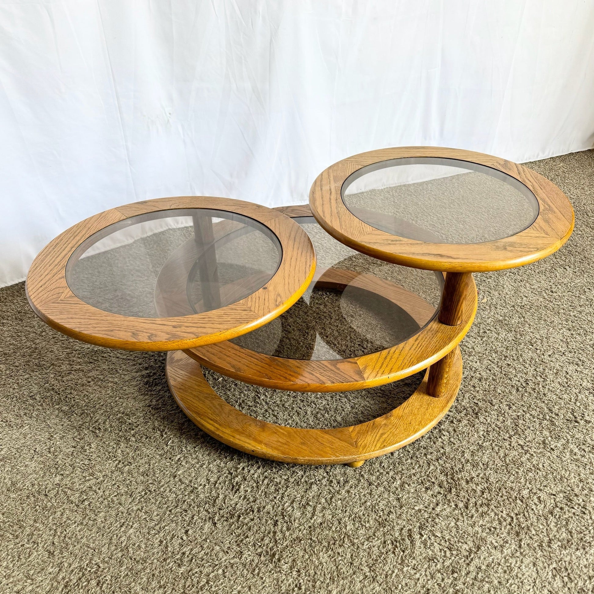 Mid Century Modern Three Tier Oak and Smoked Glass Swivel Coffee Table - Dolphin & Flamingo